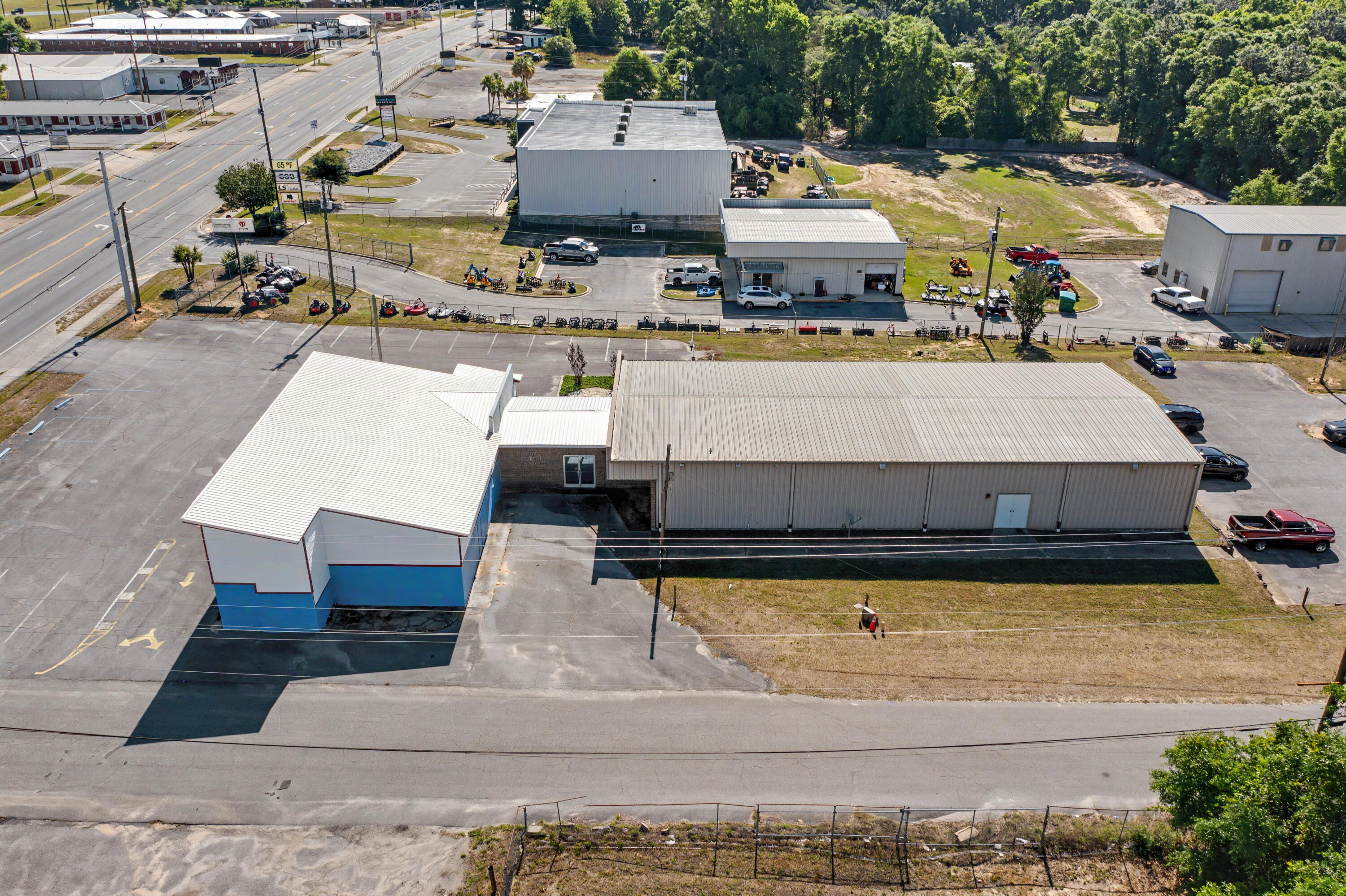 Prime Mixed-Use Commercial Property | West Crestview, FL
2.28 Acres | 8,000+ SF | Hwy 90 West & Martin St

Seize a rare opportunity in one of Crestview's fastest-growing corridors. This highly visible mixed-use property offers exceptional dual-frontage exposure with 150 feet on Highway 90 West (James Lee Boulevard) and an impressive 650 feet on Martin Street -- putting your business in front of traffic from two directions.
Ideally positioned in the heart of west Crestview's expansion and just moments from the newly opening Southwest Crestview Bypass, this property is perfectly timed for businesses looking to capitalize on the area's rapid growth and increasing accessibility.
The 8,000+ square feet of heated and cooled space offers remarkable flexibility, lending itself to a wide range of uses including retail, office, showroom, warehouse, or any combination thereof. With C2 and C3 zoning, the possibilities are broad and the barriers to entry are low.
Ample front parking ensures a welcoming and convenient experience for customers and clients, while the expansive 2.28-acre parcel provides significant room to expand operations, add structures, or grow your footprint as your business demands.
Whether you're an investor, an owner-operator, or a developer with a vision -- this property delivers the location, the exposure, the flexibility, and the room to grow that are rarely found in a single offering.