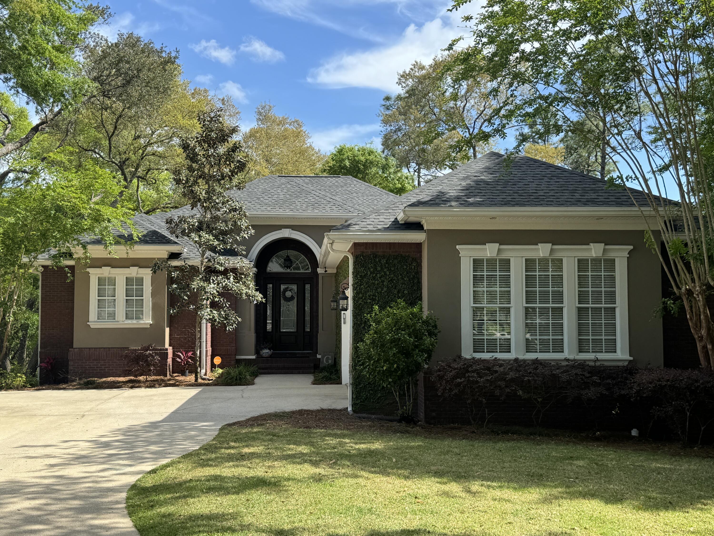 Welcome to your fabulous new home in the highly desirable Swift Creek community, where luxury, comfort, and peaceful surroundings come together beautifully. With 3,815 square feet of thoughtfully designed living space, this impressive residence offers a timeless exterior, exceptional curb appeal, and a spacious layout perfect for both everyday living and entertaining. Situated on a fully landscaped and irrigated half-acre lot, the property backs up to a serene wooded area, creating a private retreat complete with an inviting fire pit for relaxing evenings outdoors. One of the home's standout features is the expansive 27x16 covered and screened porch, positioned at tree level to fully enjoy the tranquil setting in every season. A stunning double-sided gas fireplace connects the porch to the main living room, adding warmth and charm to both spaces. Inside, hardwood flooring and upgraded lighting create an elegant yet welcoming atmosphere throughout the home. The spacious living room provides plenty of room to gather, entertain, or simply unwind.


At the heart of the home is the beautifully designed eat-in kitchen, offering a perfect blend of functionality and style. Featuring granite countertops, a generously sized island, breakfast bar seating, pantry, touchless faucet, and modern appliances, the kitchen provides ample cabinet and counter space for effortless meal preparation and entertaining. This exceptional property also includes three private bedroom suites,  each with its own full bathroom, offering comfort and privacy for everyone in the home. An additional office space provides the ideal setup for remote work, studying, or creative projects. The luxurious primary suite, which is conveniently located on the main floor, serves as a true retreat, complete with tray ceilings, private access to the screened porch, and a spa-like en suite bathroom featuring a large tiled walk-in shower with dual shower heads, a garden tub, dual vanities, a separate toilet room, and two spacious walk-in closets. The lower level offers even more versatility with a large secondary living area connecting the two additional bedrooms and full bathrooms. Extending from this space is a remarkable 427-square-foot fitness center that can easily serve as a home gym, studio, playroom, or additional office space depending on your needs. Additional features include but are not limited to a spacious laundry room with mud sink and a two-car garage.

As a resident, you'll enjoy access to an array of desirable HOA amenities, including a community pool, playground, lake park, community center, tennis courts, basketball courts, and scenic nature trails. Pets may be considered on a case-by-case basis with owner approval and a non-refundable pet fee; however, cats are not permitted. To maintain a clean and healthy environment, this property is strictly smoke-free, including vaping.