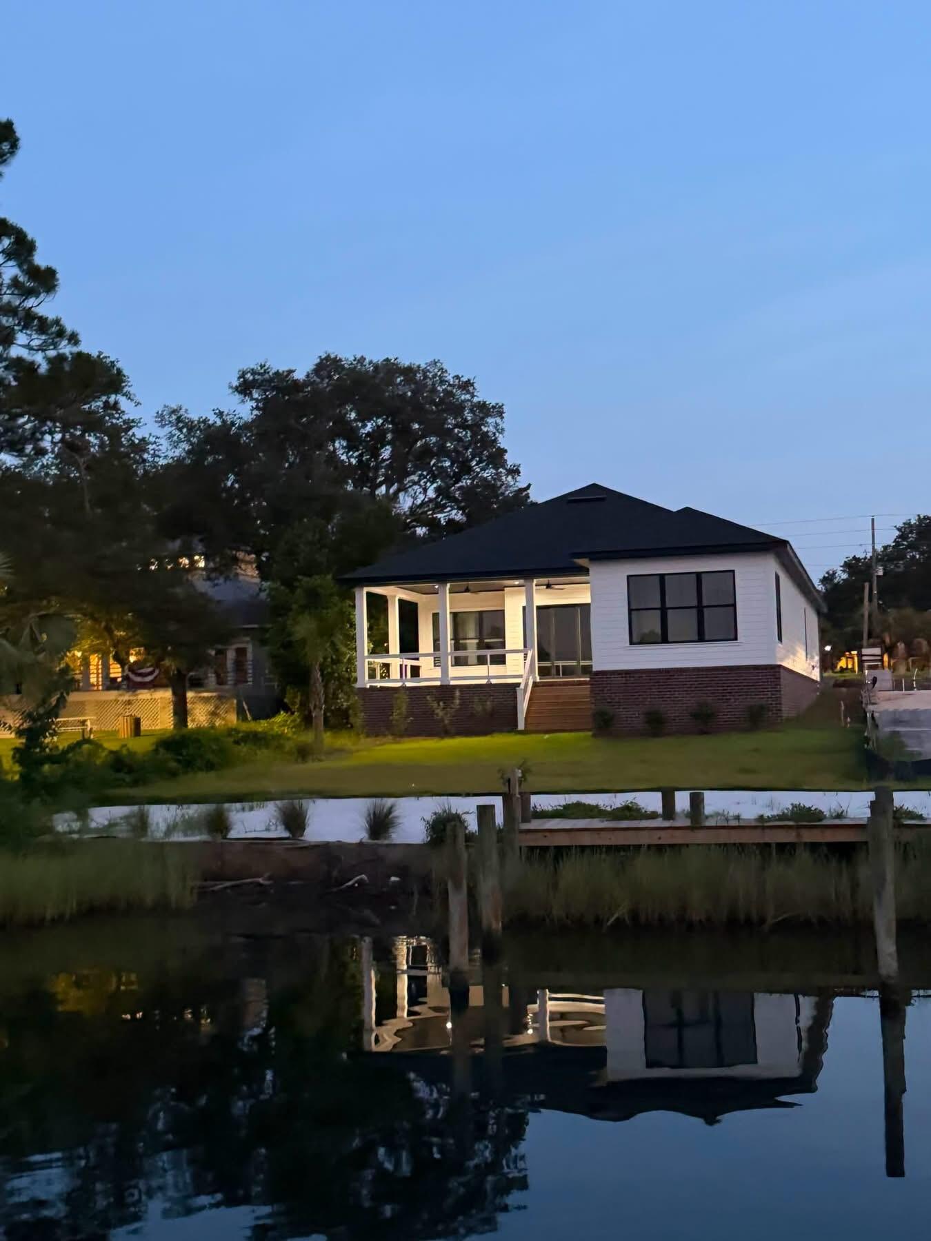 Luxury Waterfront Living with Private Dock & Boat Slip!

Experience the best of Florida waterfront living in this stunning new construction modern home featuring 4 bedrooms, 3.5 bathrooms, a private dock and boat slip, and exceptional craftsmanship throughout. Designed for both elegance and durability, this home offers 2x6 construction, impact-rated windows and garage doors, 8' solid-core interior doors, and premium finishes from top to bottom.

The open-concept floor plan is filled with natural light and showcases soaring ceilings, LED recessed lighting, gas appliances, and designer touches that create the perfect space for entertaining or everyday living. The chef-inspired kitchen flows seamlessly into the spacious living and dining areas, while oversized windows frame beautiful waterfront views.

Step outside and embrace the coastal lifestyle. Launch your boat from your private dock, spend the day fishing, paddleboarding, or cruising the waterways, then return home to relax and enjoy breathtaking sunsets from your own backyard.

Whether you're searching for a luxury waterfront home, a primary residence, or a Florida coastal retreat, this exceptional property delivers modern design, quality construction, and direct water access in one unforgettable package. Don't miss this rare opportunity to own a piece of waterfront paradise!