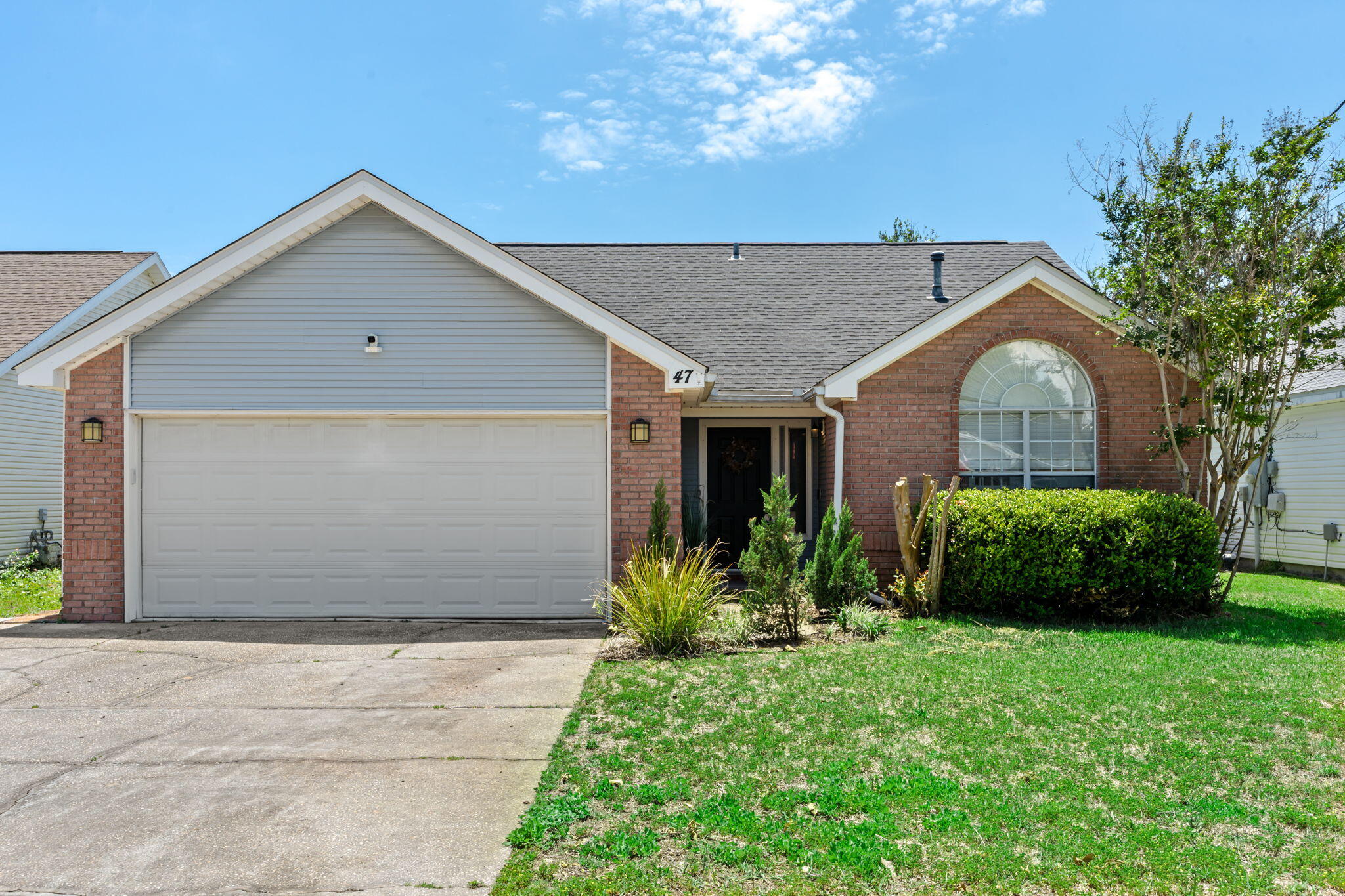 Partially furnished, single family, three-bedroom home is situated on a friendly street in the heart of Destin. Upon entering the  home, you'll find high end LVP flooring.  The modern primary bathroom and kitchen as well as the stylish finishings throughout provide the ideal blank slate for any design aesthetic. The home also boasts a two-car garage/workshop with an extra wide driveway and ample parking; Fenced backyard ideal for kids, pets and entertaining. Back yard is astroturf for easy cleaning and low maintenance.  Sweeper is provided.  But the ultimate luxury of this home is it's convenient access to the elementary school as well as Destin's best shopping and dining and the natural beauty of Destin's inland bayous, beaches, and Crab Island.  Living room, Master bedroom and dining area are furnished.  One bedroom has built in bunk beds and drawers, with room for a desk or additional dresser.  Washer/Dryer provided with no warranty.  NO Smoking on premises.  Check out this amazing rental in the heart of Destin.
