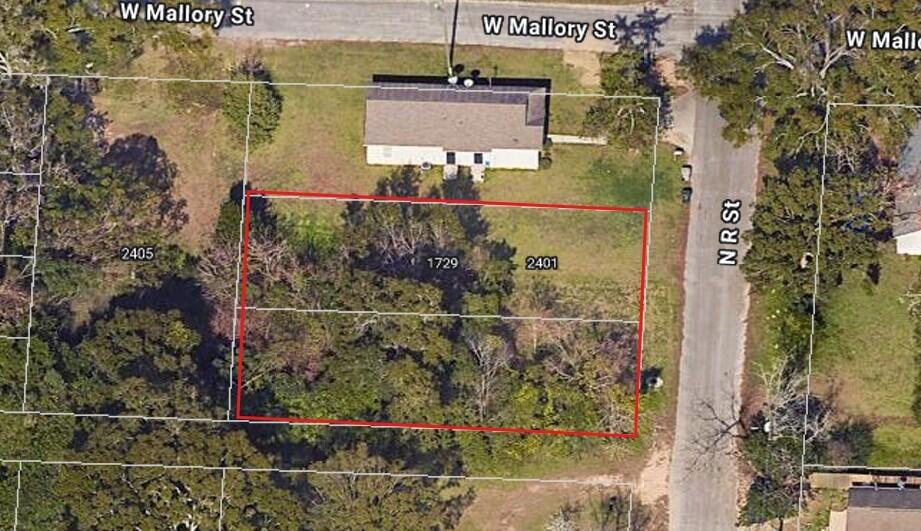 This listing is for 2 adjoining residential lots, located at 1725 and 1729 N R Street in Pensacola and are being offered together as one transaction, creating an excellent opportunity for investors, builders, or buyers looking for extra space. Conveniently located near downtown Pensacola, shopping, dining, and major roadways, these combined parcels offer added flexibility and potential for new construction or future development. Whether you're looking to build, expand, or invest, this property package provides plenty of possibilities in a growing area. Buyer to verify zoning, utilities, and intended use.