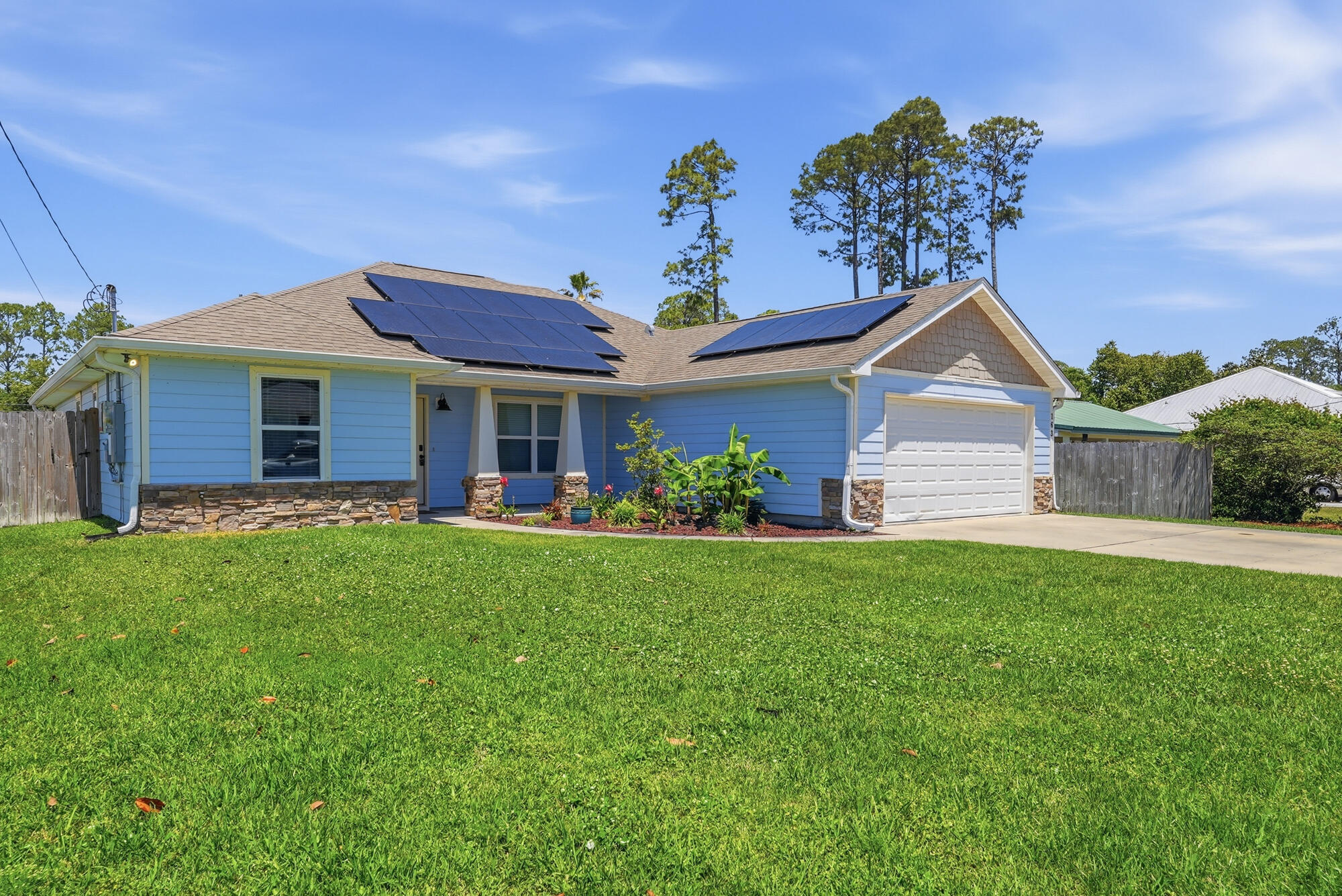 72 hour kick out clause in place. New HVAC, no HOA, and a location just minutes from the Gulf beaches make this home stand out from the moment you arrive. Situated in a quiet, established neighborhood filled with long-term residents, this property offers the kind of privacy, stability, and convenience that's becoming increasingly difficult to find in the Panama City Beach area. Inside, the home features soaring ceilings, abundant natural light, and an open, airy layout designed for both everyday comfort and entertaining. The spacious living areas flow seamlessly into the kitchen and outdoor spaces, creating a home that feels both functional and inviting. The home also includes a solar panel system that will be fully paid off by the seller at closing, allowing the new owner to enjoy the long-term energy savings. New HVAC, no HOA, and a location just minutes from the Gulf beaches make this home stand out from the moment you arrive. Situated in a quiet, established neighborhood filled with long-term residents, this property offers the kind of privacy, stability, and convenience that's becoming increasingly difficult to find in the Panama City Beach area. Inside, the home features soaring ceilings, abundant natural light, and an open, airy layout designed for both everyday comfort and entertaining. The spacious living areas flow seamlessly into the kitchen and outdoor spaces, creating a home that feels both functional and inviting. The home also includes a solar panel system that will be fully paid off by the seller at closing, allowing the new owner to enjoy the long-term energy savings and efficiency benefits without taking on the remaining balance. A transferable warranty adds even more value and peace of mind. In addition, the HVAC system was replaced in September 2025, as well as an incoming new water heater expected to be installed by May 15, 2026, providing reliable comfort for years to come. The outdoor living space is equally impressive. A fully fenced backyard with a dedicated dog run makes it ideal for pets and families, while the screened-in porch and oversized covered deck create the perfect setting for relaxing evenings, weekend cookouts, or entertaining guests year-round. The built-in irrigation system helps keep the landscaping looking its best with minimal effort. Location is another major highlight. The home is within walking distance of Scott Field Park and only a short golf cart ride to Frank Brown Park and Pier Park, giving you quick access to restaurants, shopping, entertainment, and community events. And of course, the white-sand beaches and emerald waters of the Gulf are just minutes away, making beach days easy and convenient. Additional upgrades, including the epoxy-coated garage floor and updated kitchen backsplash, add a clean, polished finish to this well-maintained, move-in-ready home. Combining smart upgrades, energy efficiency, outdoor living, and an unbeatable coastal location, this property offers a lifestyle perfectly suited for both full-time living and weekend escapes.