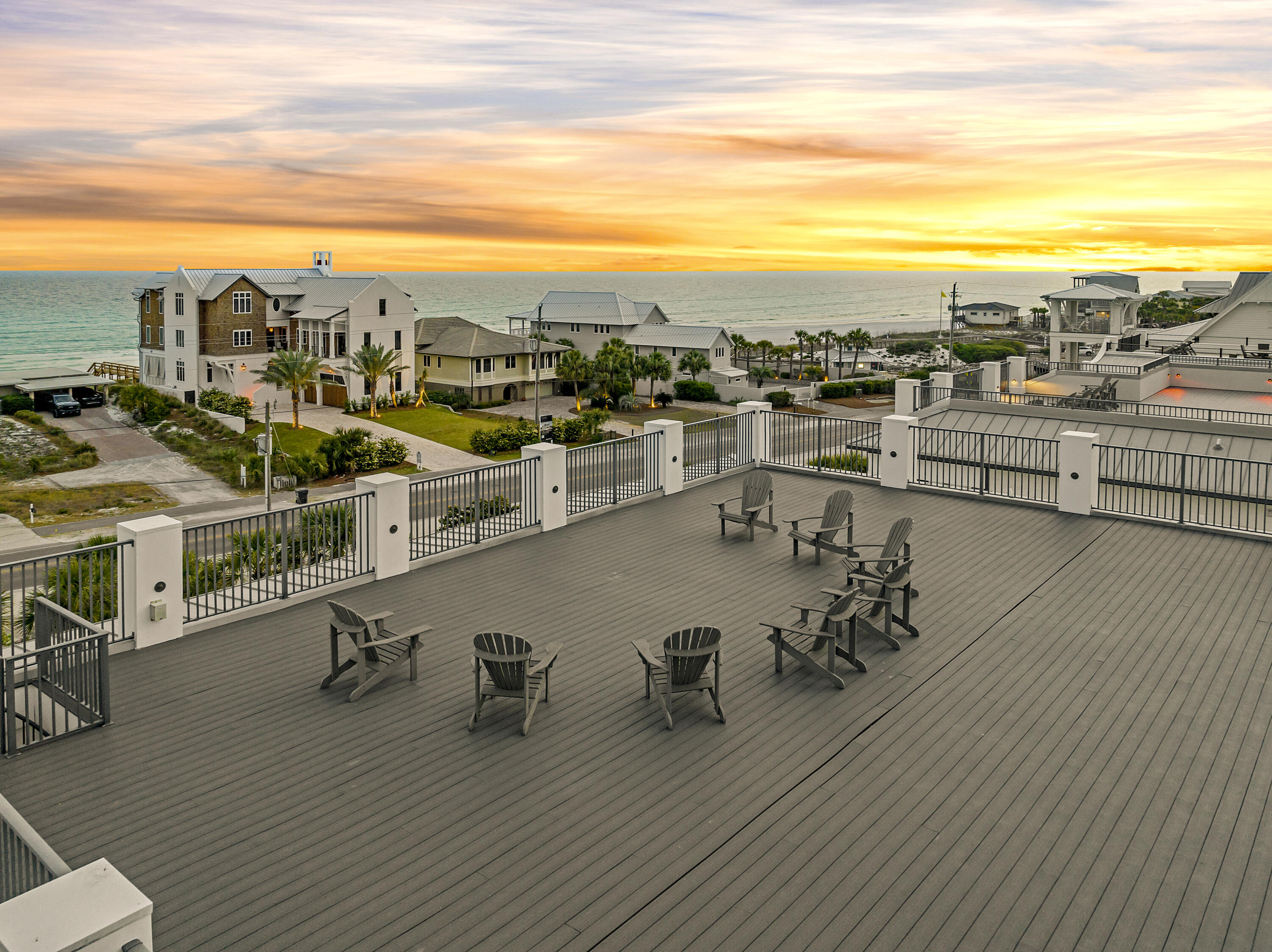 Extensively updated within the past year, list of improvements is available upon request. Perfectly positioned along scenic 30A, this striking coastal contemporary estate captures sweeping Gulf views from all three interior levels, crowned by an expansive fourth-floor rooftop deck designed for unforgettable sunsets.

Thoughtfully designed for both luxury living and high-performing investment potential, the home features an open-concept layout with multiple indoor and outdoor gathering spaces, all enhanced by professionally curated furnishings and high-end finishes by Duce & Co. Elevated to maximize its vantage point, the property showcases exceptional sightlines over the Gulf from nearly every angle. At the heart of the outdoor experience is one of the largest private pools on 30A--a stunning 50,000-gallon resort-style pool by Watermark, complete with an adjoining spa and covered gazebo. The oversized pool deck creates a true private retreat, ideal for entertaining on a grand scale.

This property is not just beautiful--it's a proven income producer, generating approximately $400,000 annually in rental income (actuals, not projections), even with significant owner use. Meticulously maintained, the pride of ownership is evident throughout.  

Notable features include:
Private elevator servicing all three floors.
Multiple master suites, including one Gulf-view master suite with a spa-inspired bathroom featuring floor-to-ceiling stone tile.
Custom built-in bunk rooms for added sleeping capacity.
Multiple indoor and outdoor living areas.
Two garage bays with the option for owner lockout.
Immediate beach access located adjacent to the home.
Three dishwashers, one on the 1st floor and two on the 2nd floor.
One wine cooler on the 1st floor and one on the 3rd floor.

The first floor offers two spacious bedrooms with en-suite baths, plus a half bath which can be directly accessed from the pool area, along with a large secondary living area featuring a game space and wet bar--perfectly positioned for seamless access to the outdoor kitchen adjoining the pool deck.

The second floor serves as the main living hub, highlighted by floor-to-ceiling glass doors framing Gulf views. The expansive living room flows into a designer kitchen and dining area featuring custom cabinetry, quartz countertops, stainless steel appliances, and an oversized island with integrated seating. This level also includes two additional bedrooms with en-suite baths, a powder room, and access to two outdoor living spaces, with one overlooking the pool and Gulf.

The third floor is dedicated to rest and retreat, featuring four bedrooms including multiple master suites, a secondary living area/den, laundry, and additional bunk accommodations. Two outdoor living spaces provide areas to relax, with one overlooking the pool and the Gulf.

The rooftop deck showcases breathtaking, panoramic views of both the Gulf and nearby coastal lake, with a prized western exposure for stunning sunsets.

Located in the heart of Dune Allen Beach, this exceptional property offers convenient access to boutique shopping, acclaimed dining, and all that 30A has to offer--making it the ultimate blend of lifestyle, luxury, and investment opportunity, along with an array of outdoor recreational activities and local entertainment that 30A has to offer.