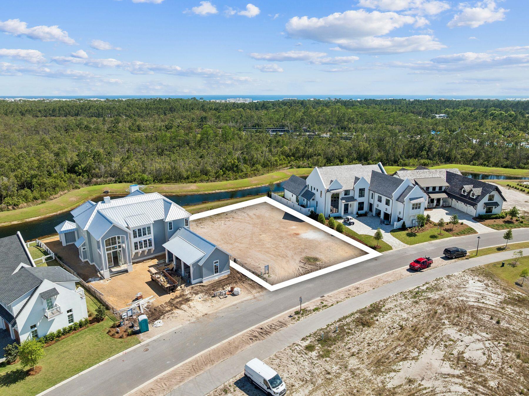 Situated within the highly sought-after Watersound Camp Creek community, this exceptional .33-acre homesite backs to a pond with designated green space beyond, offering enhanced privacy and a private preserve backdrop for your future home. Ownership includes membership to the Watersound Club, providing access to the exclusive Watersound Beach Club with pools, dining, and beach setups, along with premier golf at Sharks Tooth, Camp Creek, and The Third. Residents also enjoy the Camp Creek Amenity Center featuring tennis, pickleball, fitness center, resort-style pool with lazy river, adult-only pool, playground, game room, and multiple dining options.