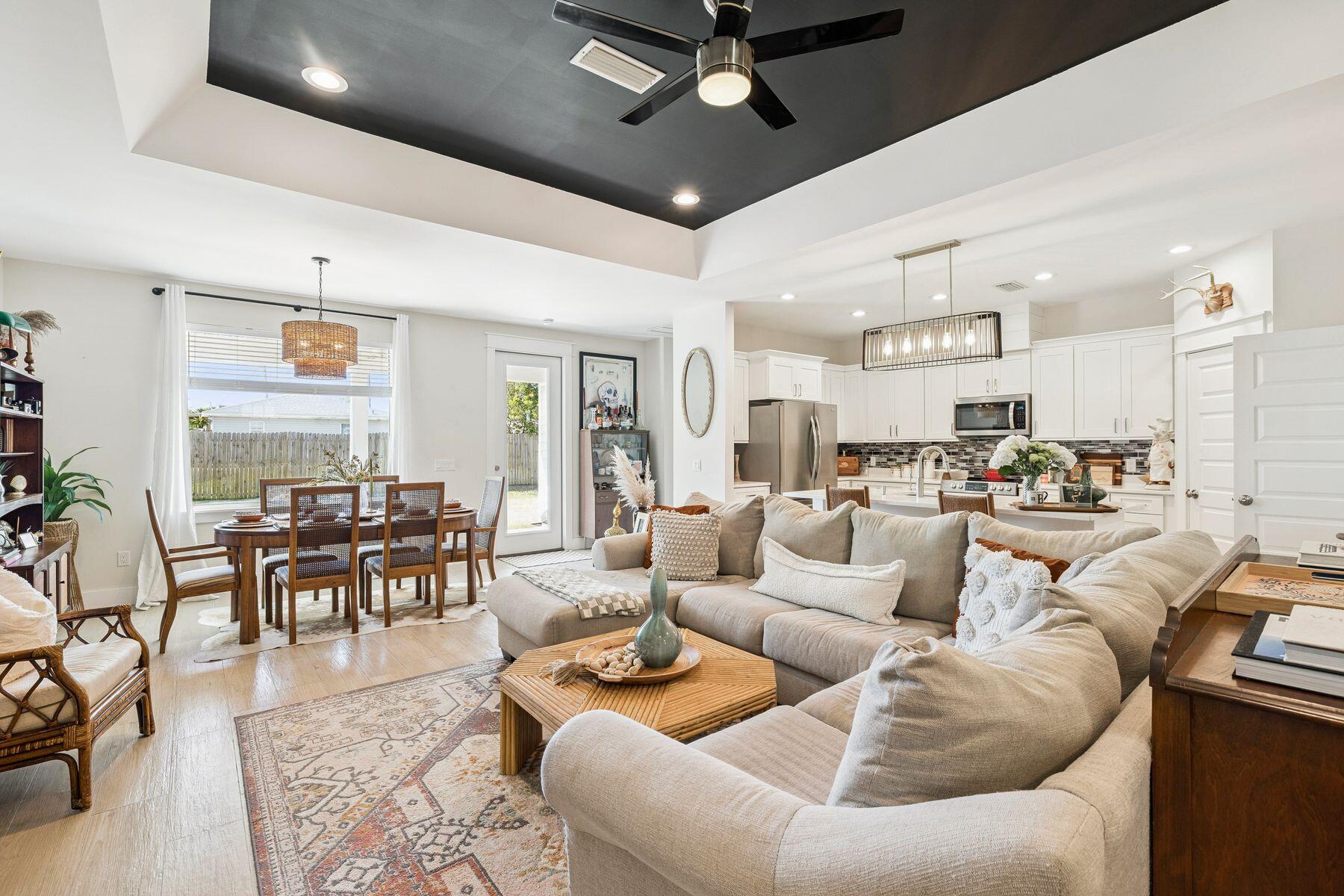 Ideally positioned just minutes from Pier Park and within easy reach of the boutiques, dining, and beach towns of 30A, this beautifully maintained three-bedroom, two-bath residence offers a refined take on effortless coastal living with the added benefit of no HOA restrictions. With 1,641 square feet of thoughtfully designed space, the home balances comfort, style, and convenience in one of Panama City Beach's most accessible locations.

Inside, a light-filled open-concept layout creates an inviting atmosphere, complemented by easy-to-maintain tile flooring with the look of natural wood, curated finishes, and seamless flow between the living, dining, and kitchen spaces. The kitchen serves as the heart of the home, featuring quartz countertops, stainless steel appliances, and tailored cabinetry that blends form and function.

A split-bedroom design provides privacy, while the primary suite offers a quiet retreat with a clean, modern aesthetic. Built with quality and efficiency in mind, the home includes double-pane windows, solid insulation, and dependable systems designed for year-round comfort.

Beyond the interiors, the lifestyle truly sets this property apart. Enjoy close proximity to Pier Park, Frank Brown Park, Northwest Florida Beaches International Airport, and convenient access to the renowned communities of 30A, all while being just a short drive from the white sand beaches. Whether you're seeking a primary residence, a coastal retreat, or a well-positioned investment opportunity, this home offers a rare combination of livability, flexibility, and location.