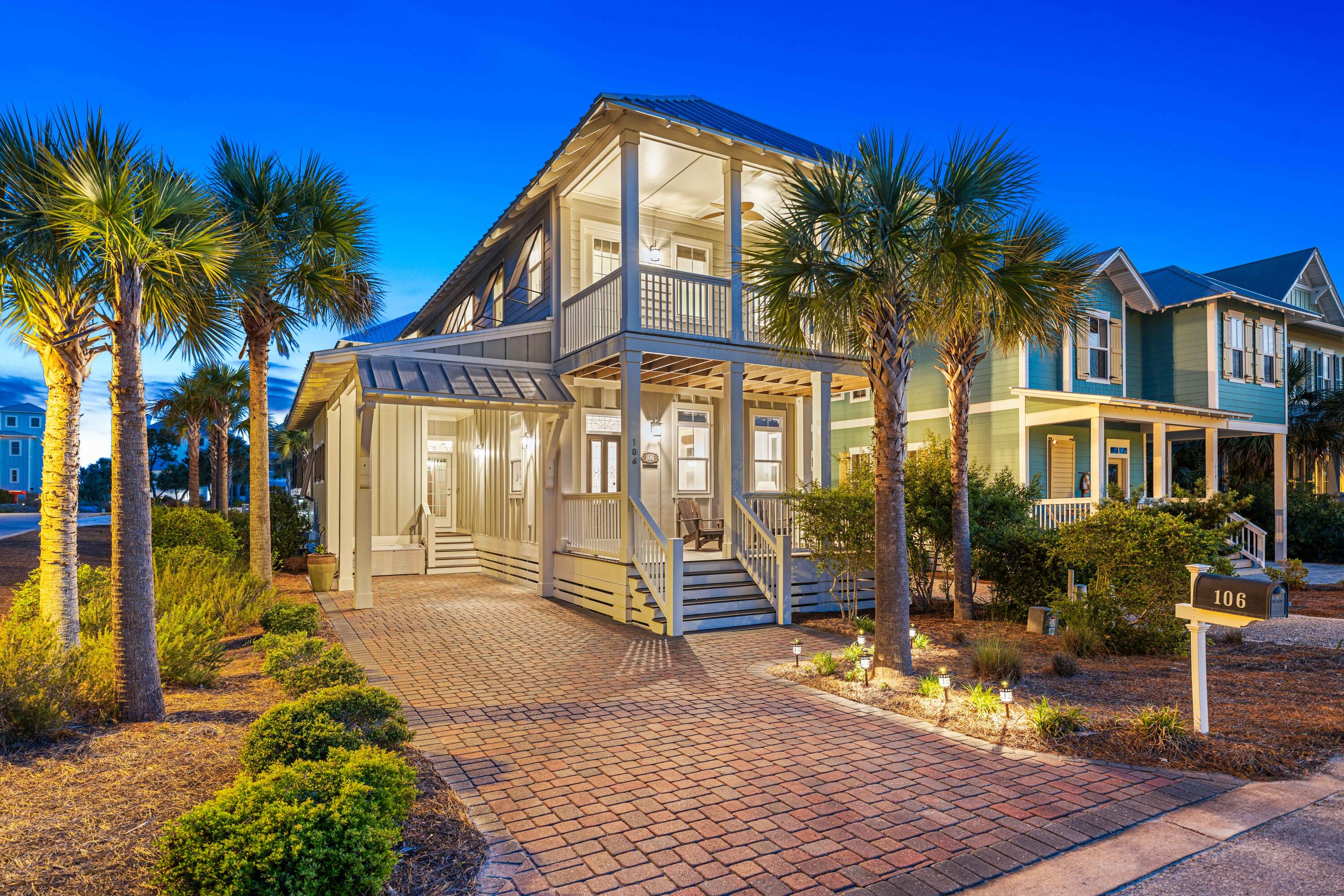 Tucked inside a peaceful gated community on Cape San Blas, this coastal home offers a blend of comfort and quality, all a quick stroll away from Gulf of America Beach Access and the community pool. This coastal 3 BR/ 3.5 BA corner lot home presents an open floor plan with 10 ft. ceilings, beautiful hardwood floors, white quartz countertops, and abundant natural light. Plentiful front porch,  balcony and patio space accentuates the blissful beach lifestyle from the front door to the primary bedroom's personal balcony access, defining both privacy and coastal living. The paring of a screened-in patio and fenced backyard deck create a tranquil grilling and outdoor space. Custom Blinds ensure additional privacy while fiberglass hurricane shutter provide added security. Entering from the front door, the open floor plan connects the length of the home from the living room to the kitchen and dining spaces. The multitude of windows surrounding the 1st floor soak the living room, breakfast bar, and dining area with natural sunlight. The kitchen is outfitted with stainless-steel appliances and accented with white quartz countertops and lighted display cabinets. Pantry space can be found adjacent to the refrigerator. The downstairs bedroom neighbors the screened-in patio and views of the sunny backyard. Across the hall, the laundry room is situated with a utility sink and two walls of cabinets and shelves for plentiful storage space. Upstairs, the guest bedroom is fitted with an ensuite bathroom, walk in closet, and private balcony with gulf views. The grandeur owner's suite features a private door out to a sizable balcony. Alongside the primary bathroom and walk in closet, a built in makeup vanity displays a quartz counter top, allowing use of the vanity while the bathroom is occupied. The primary bathroom exhibits an alcove bathtub, a large tiled walk-in shower, quartz countertops, and vessel sinks. Inside a gated community with private beach access, an exclusive coastal lifestyle is emphasized by plentiful outdoor living space and luxurious finishes for secluded residential living or vacationing.