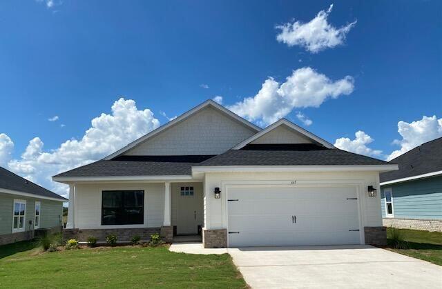 This popular Craftsman-style 3BR/2BA home (currently under construction: (Est. June/July completion) is ideally located close to the entrance of the community (next to model). Designed with both comfort and style in mind, the home features HardieBoard® siding with a brick skirt, 9' ceilings, 8' entry doors, and CoreTec Pro Plus luxury vinyl plank flooring throughout--no carpet. The spacious primary suite boasts elegant tray ceilings, a generous walk-in closet, and a spa-inspired bath. Quartz countertops in the kitchen and baths, soft-close cabinetry, spacious covered patio & wood burning fireplace complete this inviting home, perfect for relaxed everyday living and entertaining. *Pics are of a similar home.*