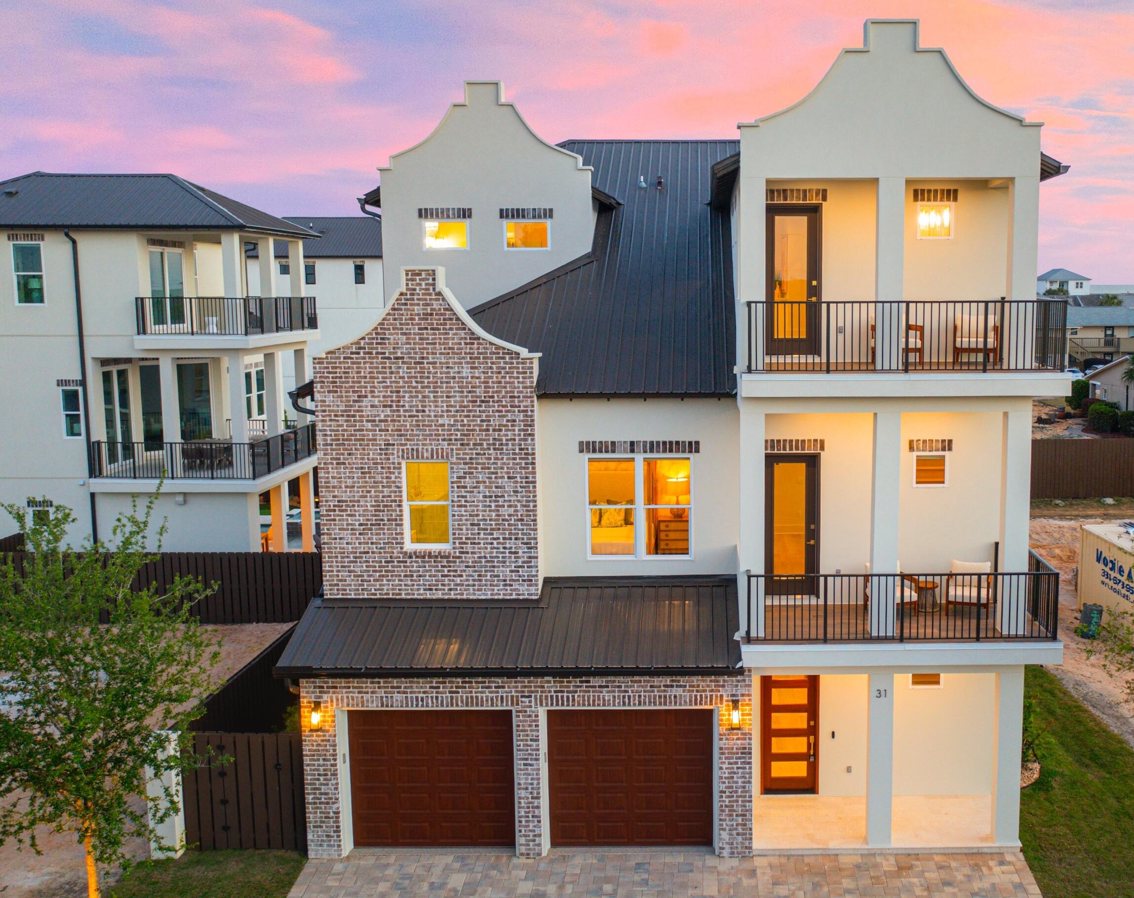 Experience elevated modern living in this brand new 3 story luxury residence thoughtfully designed with exceptional craftsmanship, high end finishes, and every amenity for comfort and entertaining. This home is fully furnished. 7 spacious bedrooms and 7 bathrooms. This stunning new construction home offers an expansive open concept layout filled with natural light soaring ceilings and seamless indoor-outdoor living. At the heart of the home is a chef's kitchen equipped with premium viking appliances, beautiful cabinetry and over sized island with quartz countertops. Perfect for entertaining on a grand scale. The primary suite is elegant with spa inspired bathroom, each additional bedroom offers an en-suite bathroom creating comfort and privacy for families and guest. Then step outside to your own resort-style backyard featuring huge pool and hot tub, spacious lounge areas, outdoor kitchen and fire pit designed for year round enjoyment. This home is just minutes from the beach, shopping and dining. This house is perfect for a family getaway or a GREAT rental investment!!