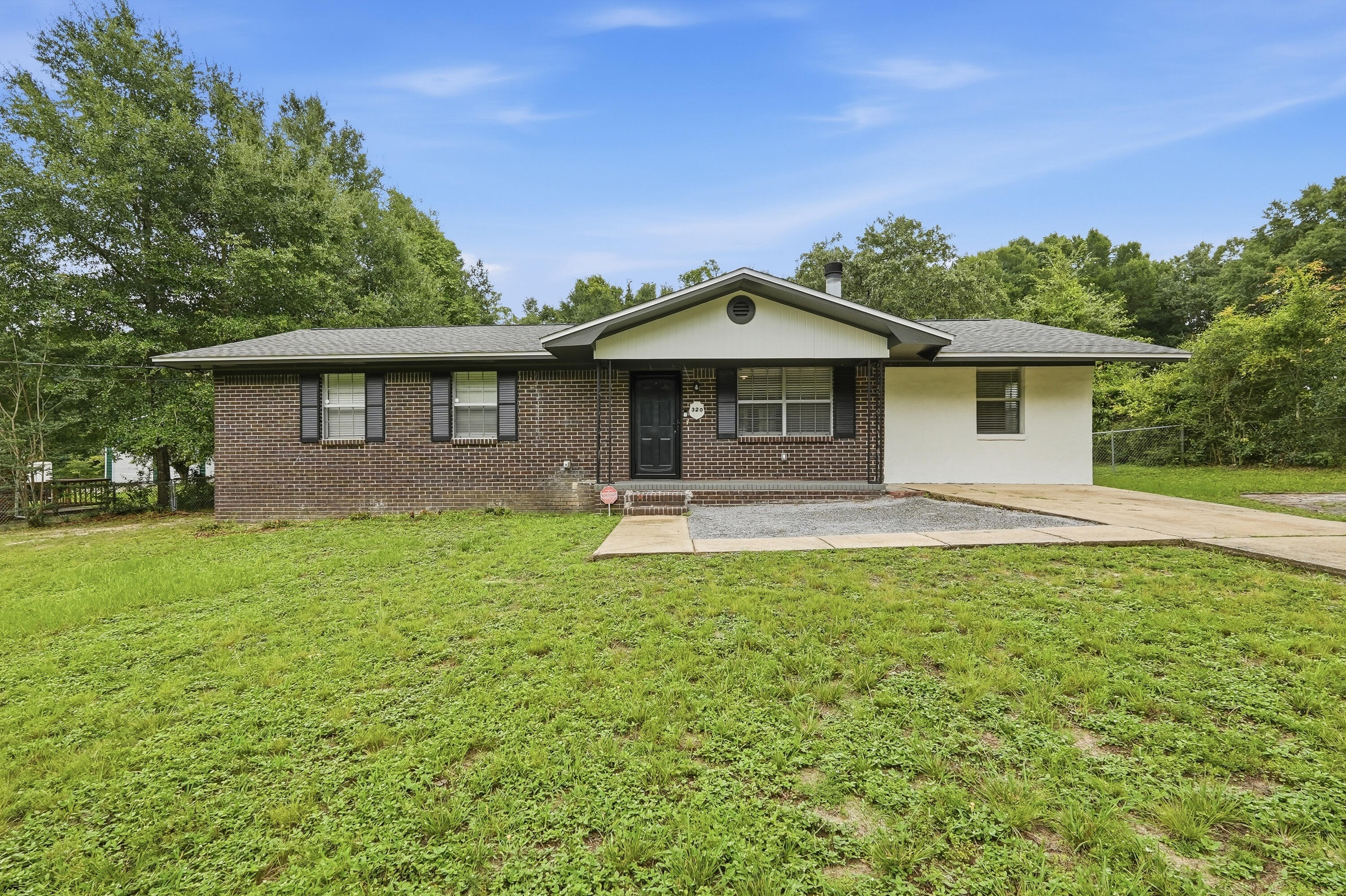 Beautifully updated and full of charm, this 4 bedroom, 2 bathroom home in Northeast Crestview is ready for its new owners. With a long list of recent improvements, including a 2022 roof, this home offers both style and peace of mind.

Step inside to a bright, open floor plan featuring luxury vinyl plank flooring, fresh interior paint, and a spacious living area centered around a cozy wood burning fireplace. The renovated kitchen is both stylish and functional, showcasing quartz countertops, soft close cabinetry, recessed lighting, and a large peninsula that provides the perfect space for entertaining or everyday living.

The generously sized bedrooms offer abundant natural light and updated ceiling fans, while both bathrooms have been refreshed with new sinks and toilets. The updated laundry room provides additional storage and convenient access to the water heater.

Outside, you'll find a spacious, level backyard with endless possibilities for outdoor entertaining, play, or future additions. Filled with character and thoughtful updates throughout, this move in ready home is the perfect place to call home.