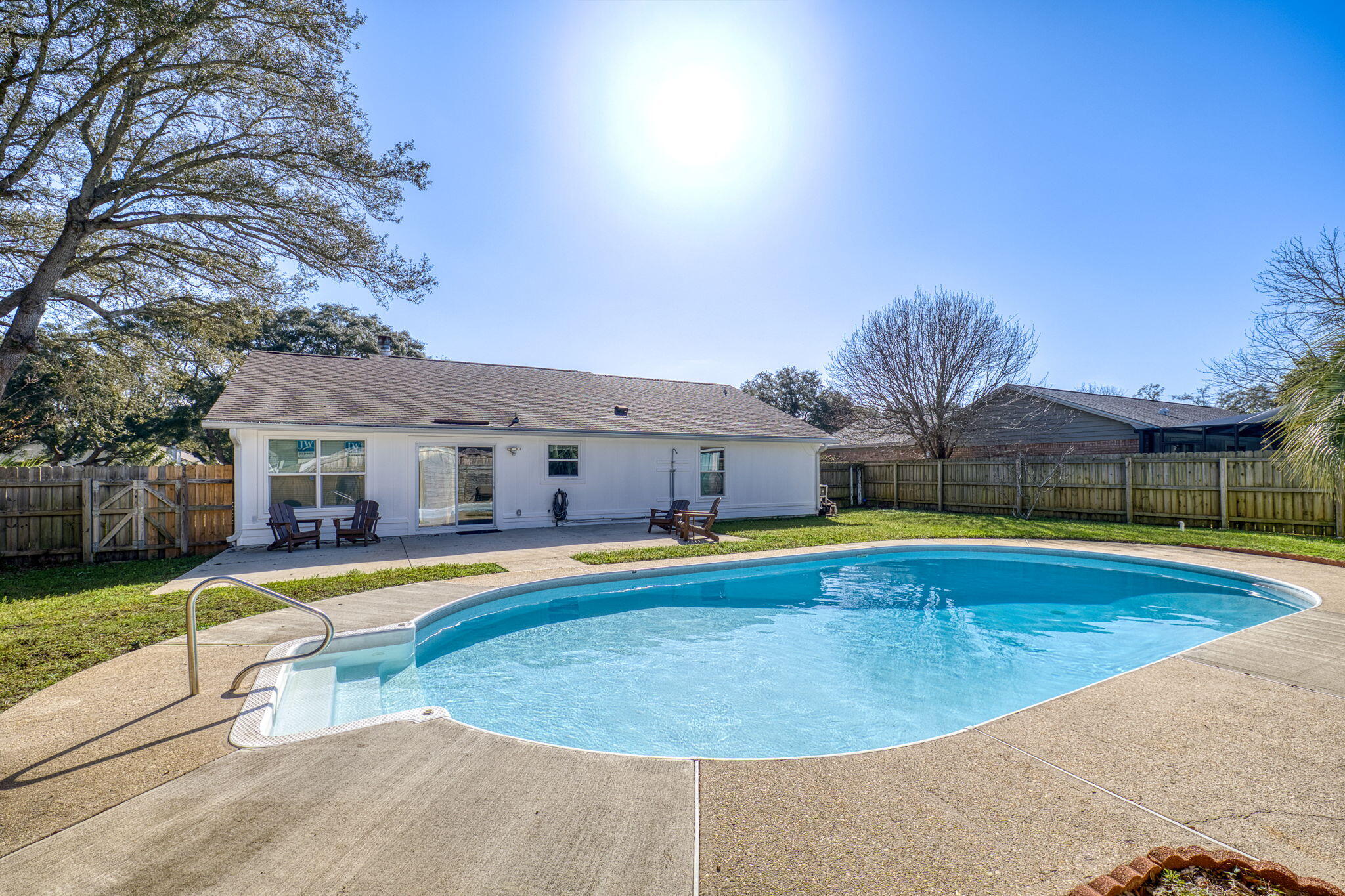 Single-story living, a private pool, and a fully refreshed interior come together in this move-in ready home located in the desirable Sandpiper Village community of Gulf Breeze. Offering 3 bedrooms, 2 full bathrooms, and 1,365 square feet of living space, this well-maintained property sits on a 0.20-acre lot and blends comfort, style, and coastal convenience.

Inside, you'll find soft neutral colors, high ceilings, and a bright open floor plan that seamlessly connects the living, dining, and kitchen areas--perfect for everyday living and entertaining. The kitchen features all-white cabinetry, dark complementary countertops, and a convenient breakfast bar for casual meals or gathering with friends and family.  >>>> Recent interior updates include luxury vinyl plank flooring, fresh paint, new baseboards, updated cabinet faces and hardware, and beautifully remodeled bathrooms with modern tile finishes, creating a clean and cohesive feel throughout.

Major system updates provide peace of mind, including a full roof replacement (2020), HVAC system (2021), new windows (2025), and a new pool liner installed in late 2024.

Step outside to your private backyard retreat with a fully fenced yard, in-ground pool, and open patio area--ideal for relaxing, grilling, and enjoying Florida afternoons or weekend gatherings.

Sandpiper Village residents enjoy access to a neighborhood park and pier, offering scenic water views, fishing, and sunset strolls. Conveniently located near top-rated Gulf Breeze schools, shopping, dining, and just minutes from the white-sand beaches of Pensacola Beach and Navarre Beach, this home offers the best of Gulf Coast living.

Whether you're looking for a primary residence, coastal getaway, or investment opportunity, this Gulf Breeze home checks all the boxes.