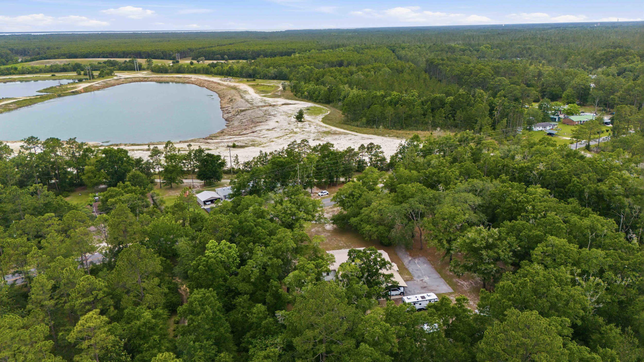 118.37FT S & 131.31FT E OF NW/C OF NW1/4 OF SE1/4; E 210 FT, S 210FT, W 210FT, N 210FT - Residential