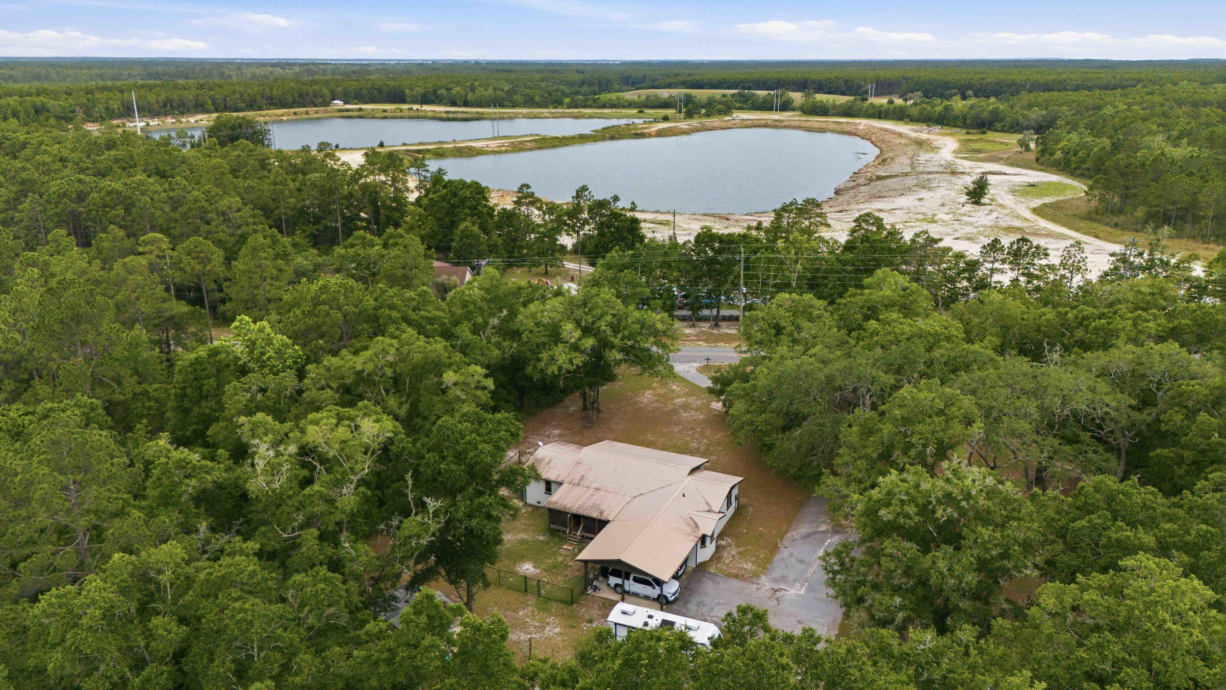 118.37FT S & 131.31FT E OF NW/C OF NW1/4 OF SE1/4; E 210 FT, S 210FT, W 210FT, N 210FT - Residential