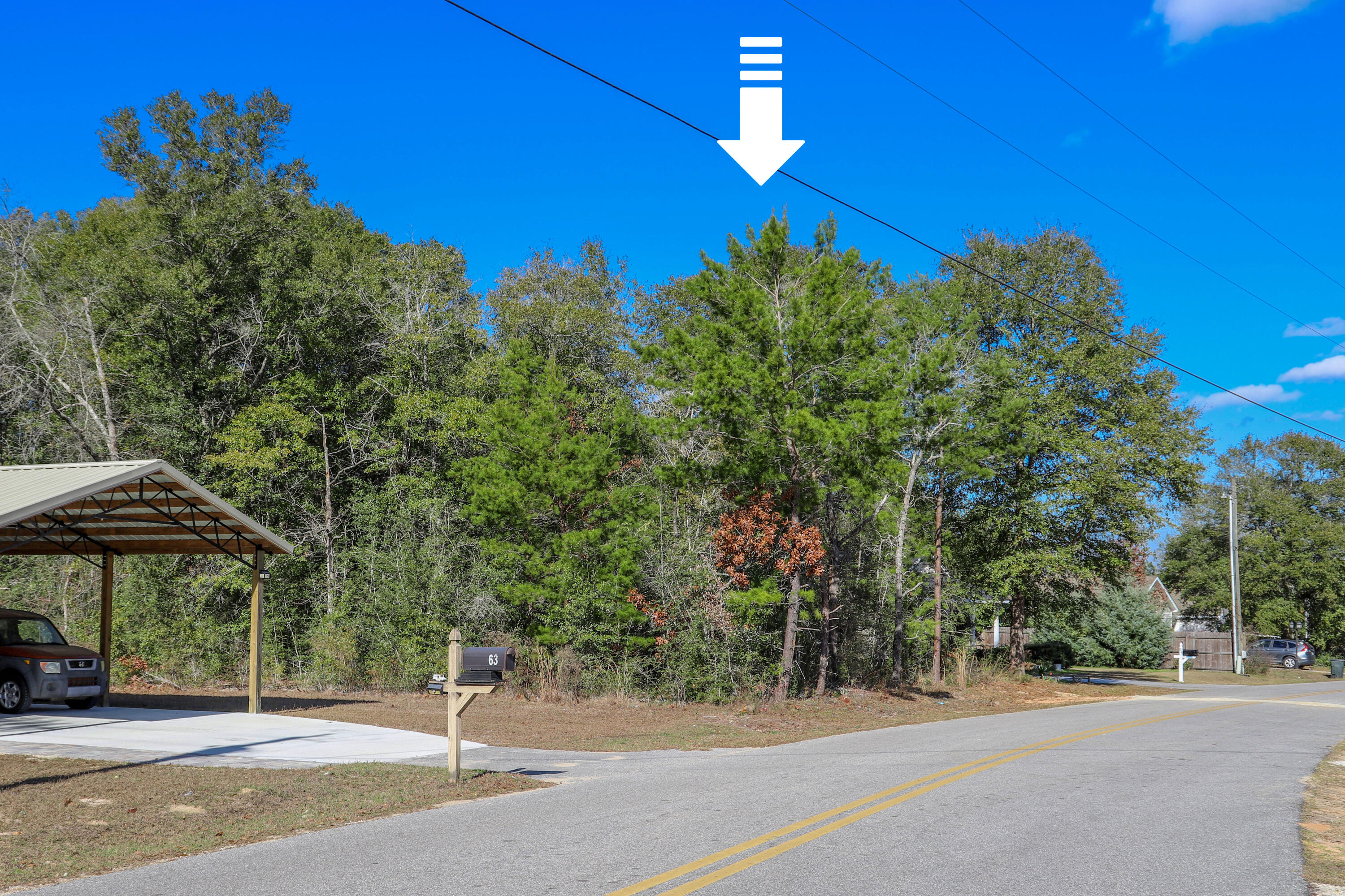 GREAT LOCATION with no HOA fees! Build your getaway home or place a mobile home. Vacant wooded lot, 0.39 of an acre in size with easy access to main highways.  0.7 miles from HWY 90, and less than 7 (seven) miles from hardware and grocery stores, schools, downtown, and the beautiful historic Lake of Defuniak. Nature lovers, this property is near many great outdoor activities like fishing, golfing, national parks, and the beautiful beaches of the Emerald Coast! (Close by popular cities: Niceville, Crestview, Destin Florida, 30A / Seaside, and Panama City Beach) GREAT LOCATION with no HOA fees! Build your getaway home or place a mobile home. Vacant wooded lot, 0.39 of an acre in size with easy access to main highways. 0.7 miles from HWY 90, and less than 7 (seven) miles from hardware and grocery stores, schools, downtown, and the beautiful historic Lake of Defuniak. Nature lovers, this property is near many great outdoor activities like fishing, golfing, national parks, and the beautiful beaches of the Emerald Coast! (Close by popular cities: Niceville, Crestview, Destin Florida, 30A / Seaside, and Panama City Beach)

This high and dry lot is located in a NON-flood zone. County-maintained paved road.

There are no utilities currently on the property.

Power: Available in the area
Water: Public water available; tap fees apply
Sewer: Would require a septic system
Boundary survey is available.
Claim your piece of Florida land