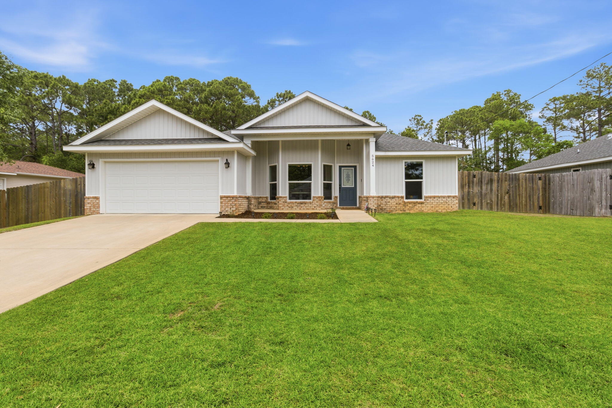 **$5,000 towards Buyer Closing Cost!!!** Welcome to 5624 Charter Circle, a beautifully maintained home nestled in the heart of Gulf Breeze. This property has been immaculacy kept and is move in ready! Thoughtfully designed, the home features spacious living areas filled with natural light, creating an inviting atmosphere ideal for both everyday living & entertaining. The interior showcases a well-appointed kitchen with ample cabinetry, seamlessly flowing into the main living & dining areas. Additional features include vaulted ceilings, modern finishes, a neutral color theme, LVP & tile flooring throughout. Step outside to a fully fenced backyard designed for both privacy & enjoyment--ideal for pets, outdoor gatherings, or quiet evenings on the covered backporch. The master bedroom offers a private en-suite bath and a large walk-in closet. No HOA and zoned for the brand-new Soundside High School.