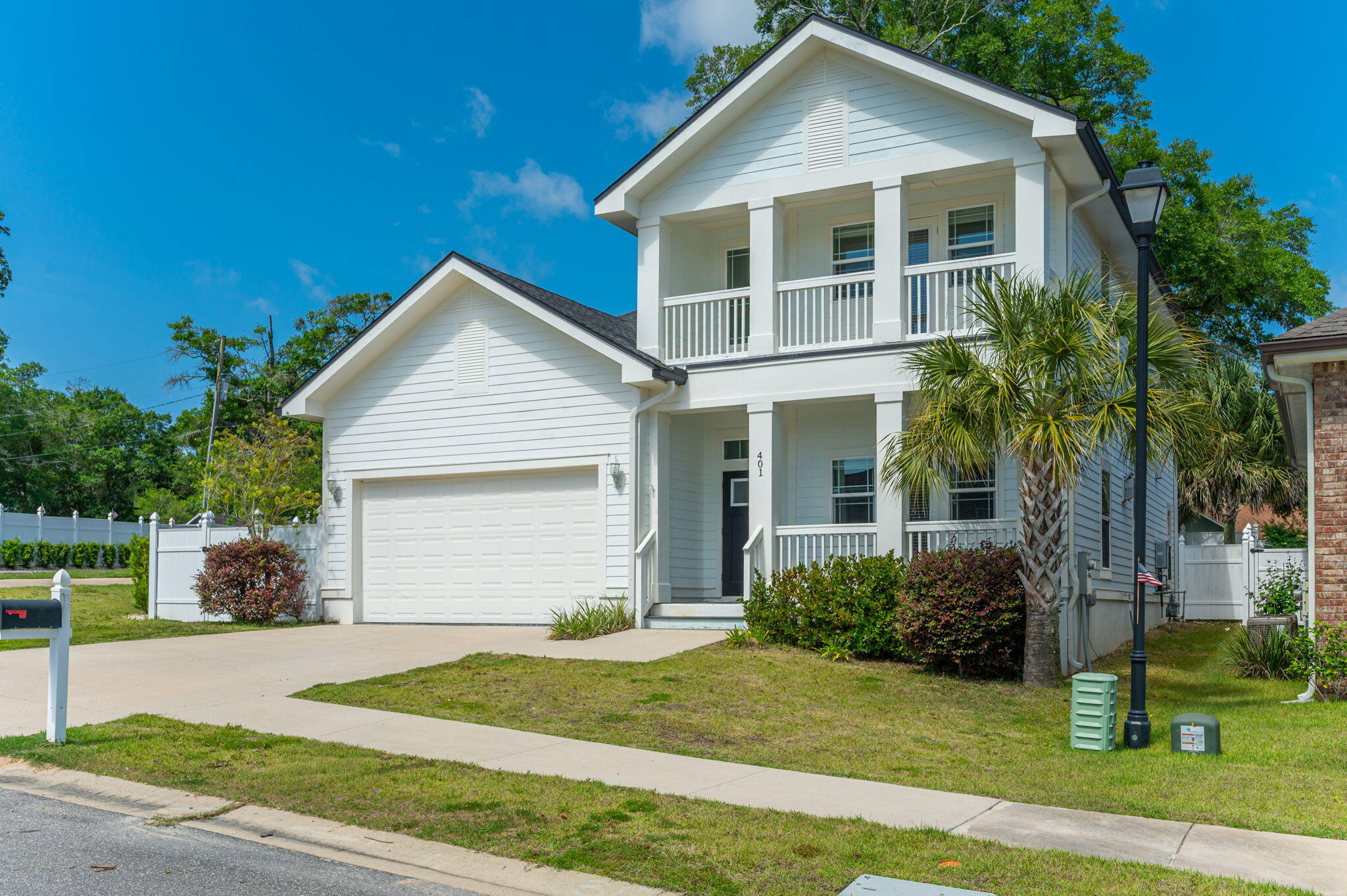 Offering gorgeous views of the Boggy Bayou, this 5/3 two-story home has the perfect blend of comfort, space, and coastal charm. From the moment you step inside, you'll notice the soaring 10-foot ceilings, stunning beamed accents, and open-concept. The spacious living room boasts a gas fireplace and flows seamlessly into a kitchen that features granite countertops, tile backsplash, large pantry, and a breakfast bar. The bedrooms throughout the home are generously sized, with two bedrooms conveniently located on the main floor and additional bedrooms plus a loft area upstairs.
The primary suite is designed as a relaxing retreat with a double vanity, tiled walk-in shower, separate water closet, and spacious walk-in closet.
Step outside and enjoy peaceful bayou views from not one, but two covered porches, one on each floor. The large backyard offers plenty of room to relax or entertain!