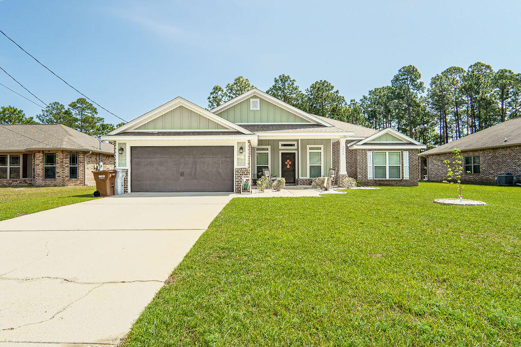 Welcome to 2036 Shannon Road, where comfort meets thoughtful design. The open-concept layout creates a welcoming flow, perfect for both relaxing evenings and gathering with friends and family. The heart of the home is the beautifully designed kitchen, complete with granite countertops, soft-close drawers, and stainless steel appliances.  Luxury vinyl plank and tile flooring run throughout the home blending style with everyday practicality. Insulated interior walls between bedrooms, bathrooms, and living spaces provide added peace and quiet, creating a more serene living experience. The primary suite offers a cozy retreat with its tray ceiling and private en-suite bathroom, featuring a new double vanity, a walk-in shower, a relaxing garden tub with tile surround, and a spacious walk in closet. Outside, you'll find an open patio and fenced backyard ideal for enjoying fresh air or weekend lounging. The backyard extends past the fence giving even more space for outdoor adventure. Two car garage with attic access adorns the front of the home. This is a great one, call for your appointment today!