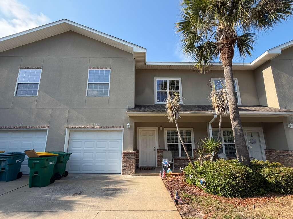 Just outside the back gate to Hurlburt Field and only about 9 miles from the front gate of Eglin AFB, this beautifully located 3-bedroom, 2.5-bath townhome offers an unbeatable convenience for military personnel stationed at either base. The property features excellent parking options, including a one-car garage, two driveway spaces, and additional guest parking right outside.

Inside, you'll find high ceilings with upper windows that fill the home with natural light, enhancing both the living room and loft areas. All bedrooms are located on the second floor for added privacy, along with a spacious loft that can easily serve as a home office, study, or flex space. The first floor offers a functional layout with a half bath, a large laundry room, and an open-concept living, dining, and family room area that flows into the kitchen. The kitchen is well-appointed with granite countertops and all major appliances included.

Pets may be considered with owner approval and a non-refundable pet fee. Please note this is a non-smoking property, and vaping is not permitted.
