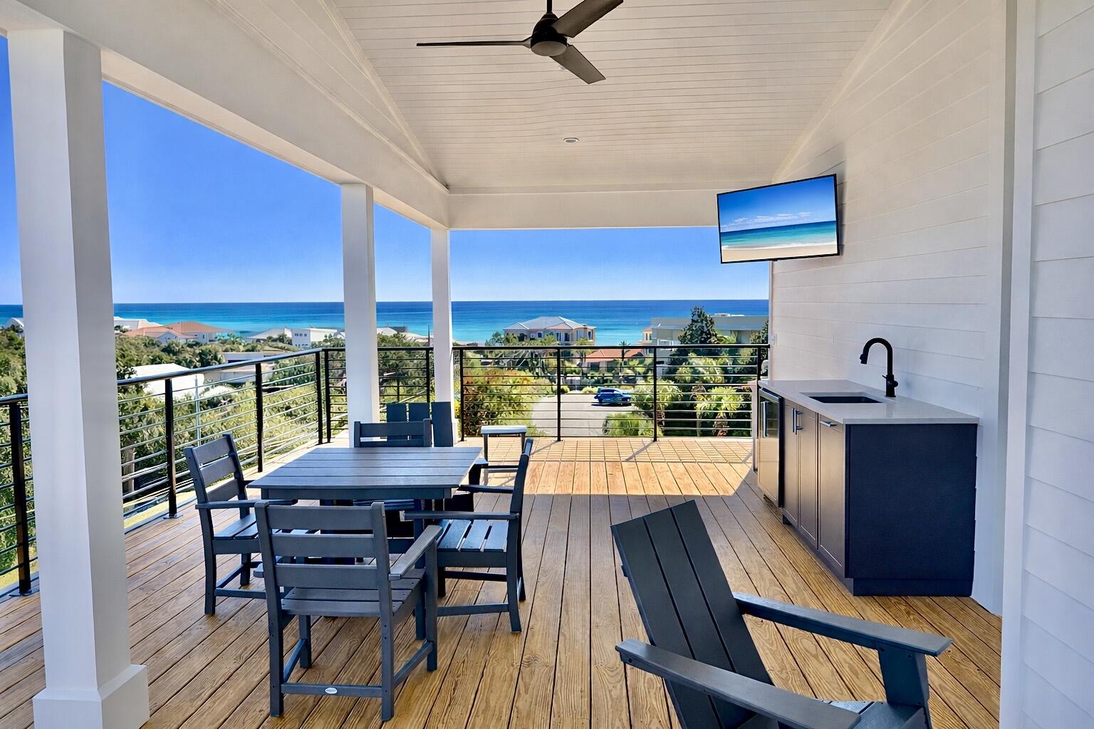 ** $190,000 + in rental income booked for 2026 rental season. ** Brand-new and just finished, this four-story beach retreat sits south of Scenic Highway 30A on Mary Street, less than a 5-minute walk to the white sand beaches and emerald green waters of Blue Mountain Beach, Fla. Designed as a true rental powerhouse with projections around $235,000, this 5BR/5BA+2 half bath home is built for fun, comfort, and income. The first level lives like a poolside cabana, with a mini kitchen, half bath, and a full wall of sliders that open straight out to the private pool and sun deck--perfect for entertaining. Upstairs, the main living floor offers a large open kitchen, dining, and living area with Thermador appliances, a gas range, a sweeping island, and a walk-in pantry, ideal for big groups to gather. The whole second floor is dedicated to this open