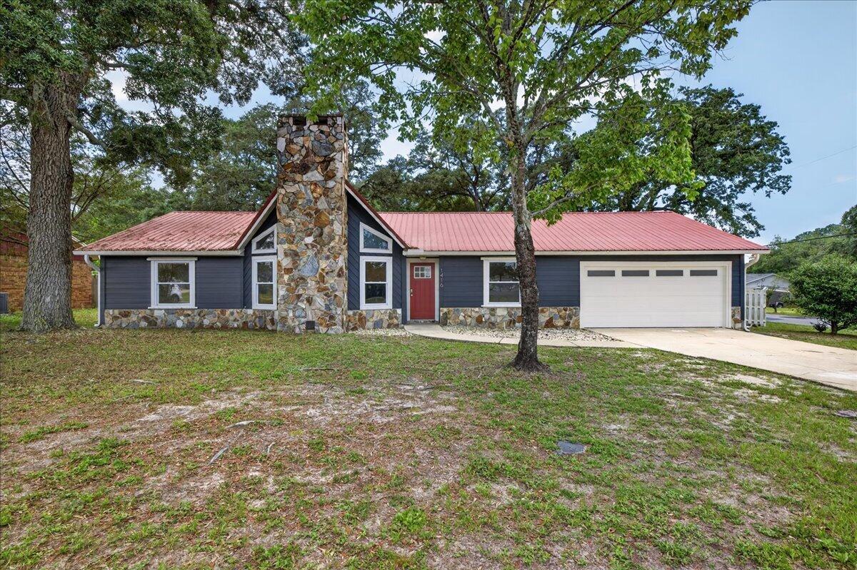 This beautifully updated 3-bedroom, 2-bath home sits on a spacious corner lot in the heart of Niceville. Recent renovations include brand new LVP flooring, fresh paint throughout, and a remodeled kitchen featuring granite countertops, stainless steel appliances, and soft-close cabinetry.
The living room impresses with vaulted ceilings and a floor-to-ceiling stone fireplace. A heated and cooled Florida room provides the perfect flex space for entertaining. 
A private primary suite sits separate from the secondary bedrooms and features an en-suite bath and ample closet storage. Two additional bedrooms share a hall bath.
Outside, enjoy a fully fenced backyard complete with a storage shed/ workshop. In addition to the attached 2-car garage, a covered carport with a separate driveway provides plenty of room for a boat, RV, or extra vehicles.
Conveniently located with easy access to local military bases, top-rated schools, and just a short drive to the beautiful white sand beaches of the Emerald Coast.