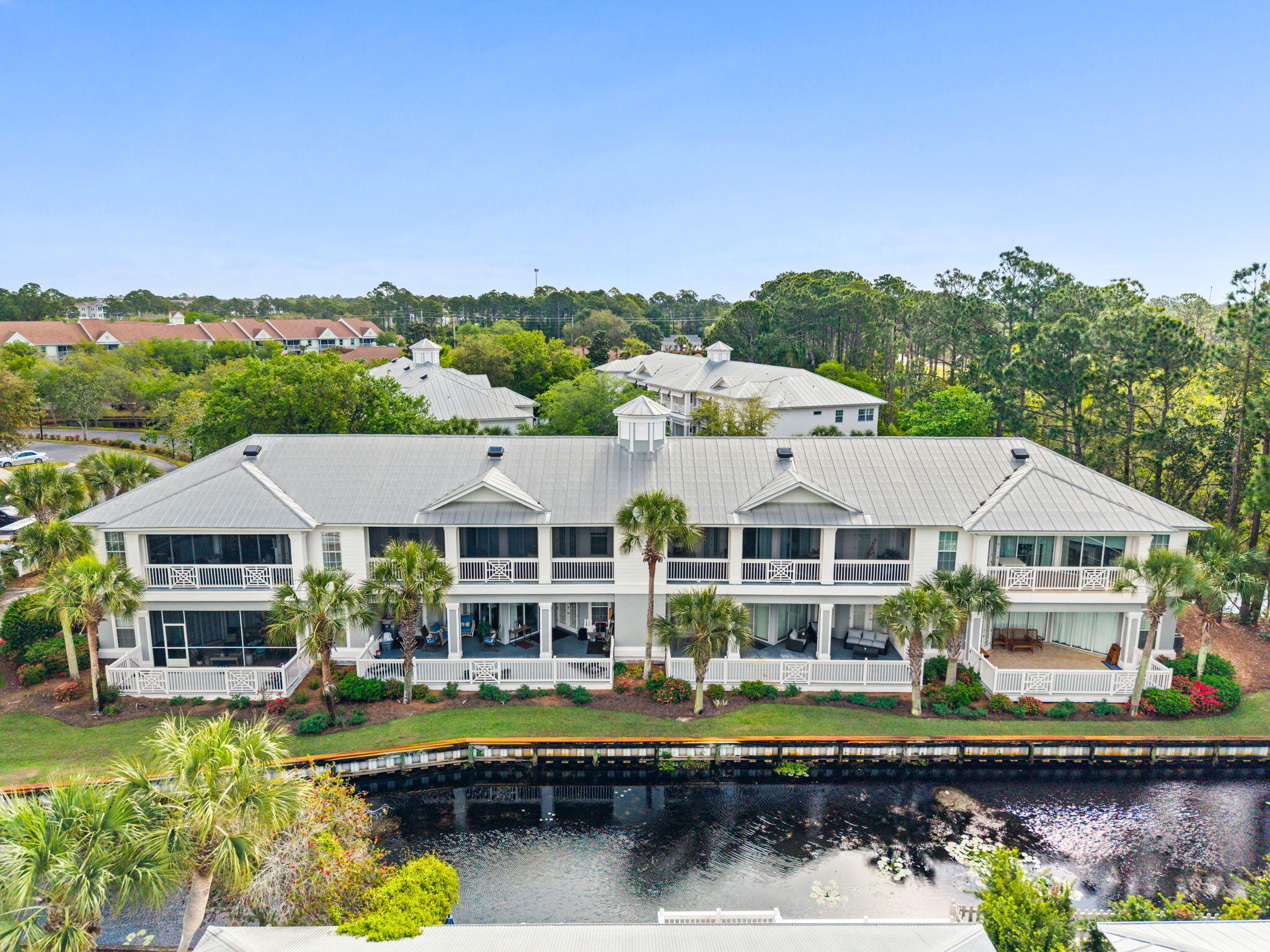 Welcome to Sandestin--a premier golf cart-friendly community offering convenience, charm, and resort-style living. Located in the desirable Crystal Cove neighborhood, this beautifully maintained first-floor condominium combines comfort, privacy, and effortless coastal living.

This single-level unit features an expansive, partially covered back patio--perfect for relaxing, entertaining, or soaking up the Florida sunshine. The fenced outdoor space offers added privacy and showcases lush tropical landscaping with palm trees, serene canal views, and partial lake vistas, creating your own private oasis.

Inside, the home is filled with natural light thanks to a sliding glass door and two sets of French doors that seamlessly connect indoor and outdoor living. Elegant white plantation shutters add a timeless touch throughout. Durable tile and luxury laminate flooring make maintenance easy and are ideal for a beachside lifestyle.

The kitchen is both functional and inviting, featuring stainless steel appliances and vibrant cabinetry that adds warmth and personality. Additional highlights include an exterior storage closet and recent exterior painting for the building, reflecting the property's excellent upkeep.

Offered fully furnished (with a few owner exclusions), this move-in-ready condo is perfect as a primary residence, vacation getaway, or investment opportunity.

As part of the Sandestin Master HOA, residents enjoy access to two pools and deeded beach access. Sandestin Resort amenities elevate the experience even further with tennis courts, multiple pools, four golf courses, a marina, dining, shopping, and the lively Baytowne Wharf--offering year-round entertainment for all ages.

Don't miss the opportunity to own a slice of paradise in one of the Gulf Coast's most sought-after communities. CRYSTAL COVE HOA FEES are approximately 1/2 of other SANDESTIN CONDOS AND one of the few that offers a walk-in SHOWER.