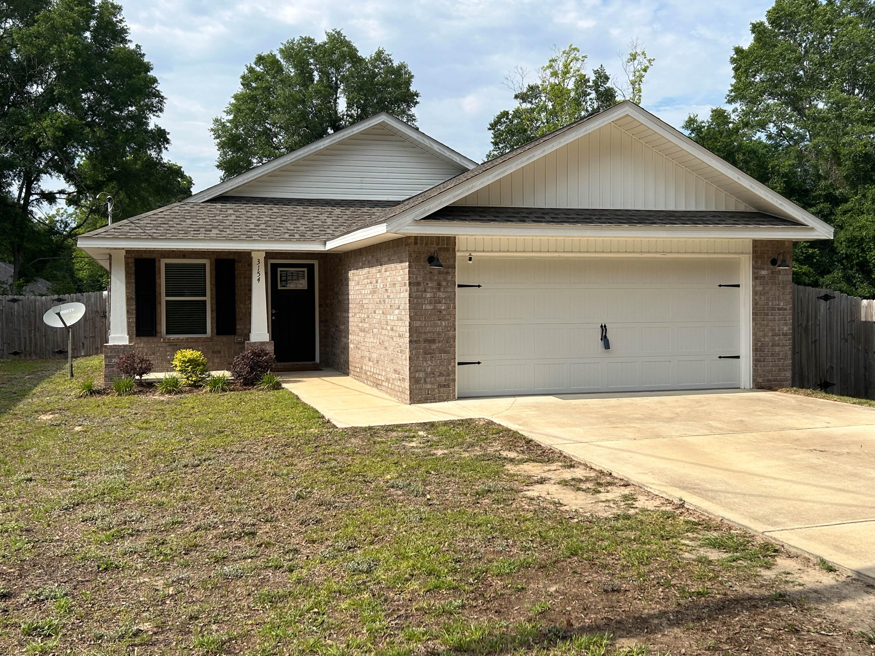 All brick construction features 2 car garage, covered porch off the kitchen for relaxing. Open floor plan features tray ceiling in living room, work island w/bar seating in kitchen, pantry, stainless steel appliances, shaker style cabinets with soft close doors/drawers,  additional bedrooms have large closets, master bathroom has double vanities and walk-in closet.  Carpet in bedrooms, luxury vinyl plank in common areas, quartz counter tops in kitchen and baths. Buyer and/or agent to verify all information