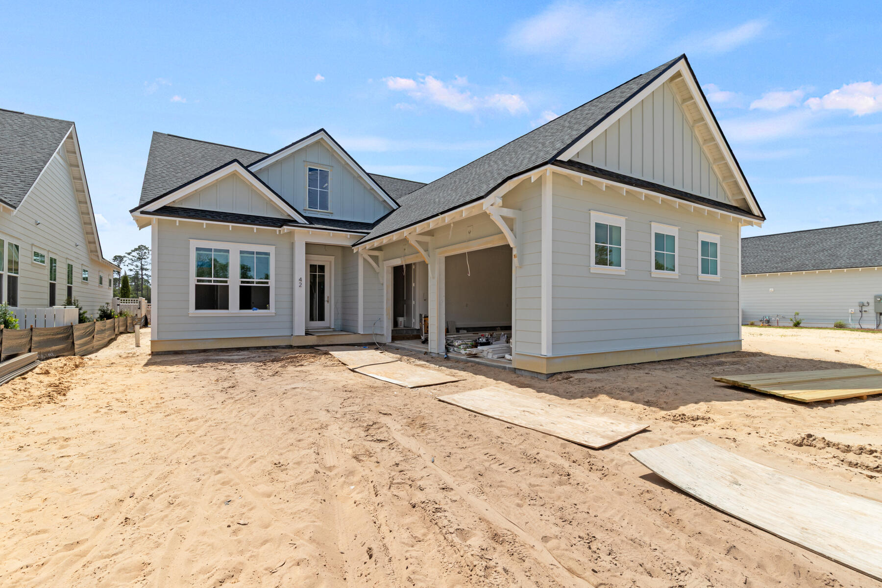 Welcome to the Florence floor plan by Arkon Group, a stunning new construction home in Powell Landing West in the Watersound Origins community. This thoughtfully designed residence offers 4 bedrooms, 4 bathrooms, and 2,484 square feet of beautifully crafted living space, perfect for those seeking modern comfort and style. Step inside to discover quality finishes such as LVP flooring, 10' ceilings, crown molding, shiplap wall accents, and an open-concept layout designed for effortless entertaining. The chef's kitchen is a true showpiece, featuring high-end stainless steel appliances, wood cabinetry with easy glide drawers and under cabinet lighting, and extra cabinets on kitchen island with quartz countertops. The spacious living and dining areas flow seamlessly, creating an inviting atmosphere for gatherings. Unwind in the primary suite, which boasts a spa-like bath with a tiled shower and freestanding tub. Three additional guest bedrooms, each with access to a full bath, provide ample space for family and visitors. Enjoy peaceful outdoor living with a spacious and private screened rear porch, perfect for year-round enjoyment. A side load 2-car garage + elegant gas lantern add to the charming curb appeal of this home.

Estimated Completion: early-June 2026

Experience refined coastal living in one of Watersound Origins' most sought-after neighborhoods nestled alongside Lake Powell. The Watersound Origins community offers an unparalleled lifestyle in South Walton - exceptional amenities, notoriously friendly and welcoming atmosphere, zero short-term rentals, and close proximity to all that 30A and Inlet Beach has to offer. Enjoy the zero-entry pool, playground, sports courts, and fitness center at the Village Commons, play a round of golf at the Origins Golf Course, or take a walk along the many miles of walking and biking trails that wind all throughout the neighborhood! The new Watersound Town Center located at the entrance to the community offers several fantastic dining options (casual and formal), medical services, Starbucks, Publix, a Pavilion that hosts events year round, and more!