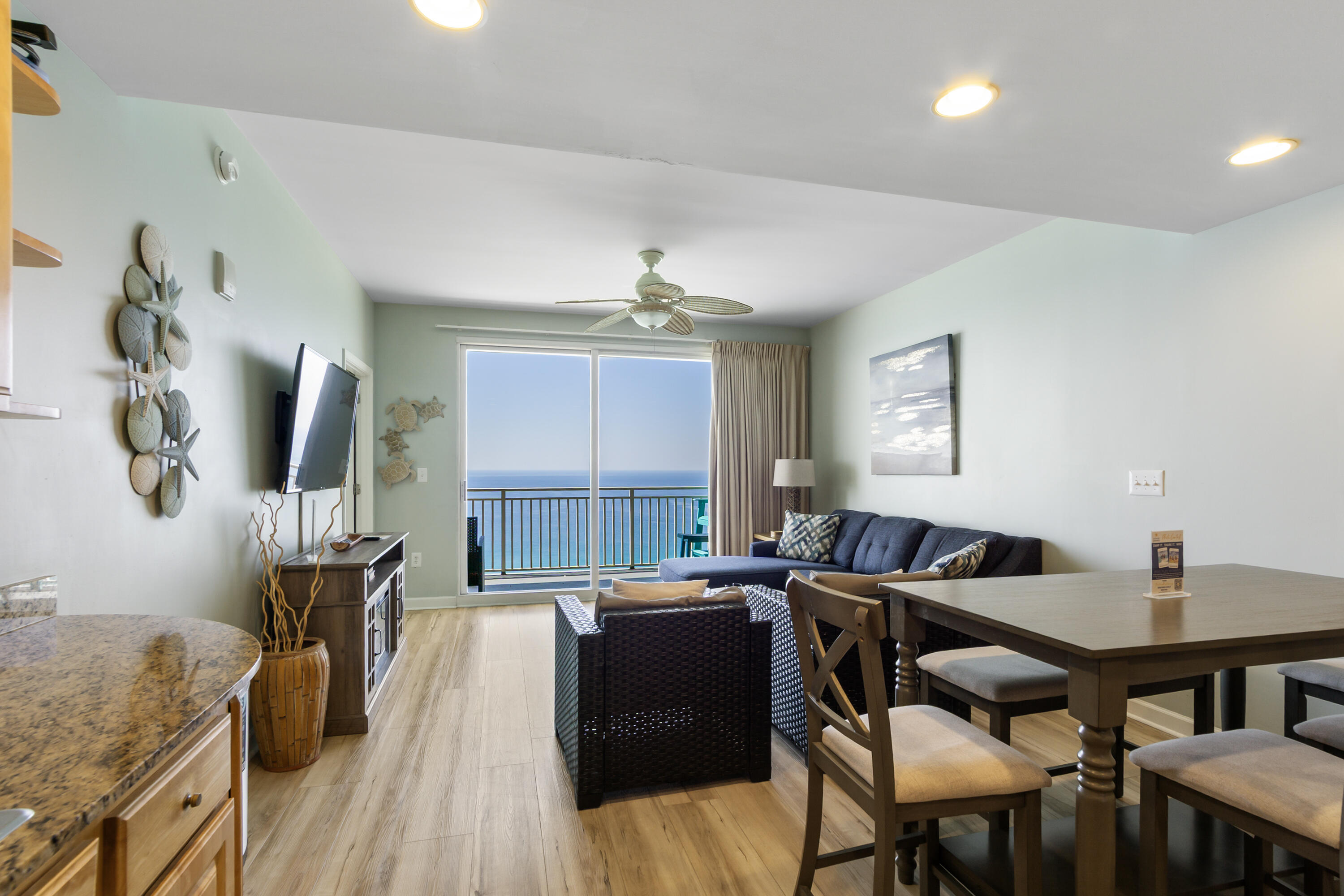UPDATED! UPDATED! UPDATED!  Direct Gulf Front, Immaculate & Beautiful 2BR/2BA condo in Fabulous Splash was Featured on HGTV Beach Front Bargain Hunt.  Custom cabinets with stainless pull knobs, granite countertops in kitchen & bathrooms.  UPDATES GALORE:  2025:  LVP flooring, appliances, furniture, decor & artwork, toilets, washer/drier & balcony furniture.  2024: AC & Hot Water heater.  Fabulous views of the Emerald Coastline Waters from the moment that you open your front door!  Enjoy the amazing sunset views & white sandy beaches from your large balcony with lots of seating.  Gulf front master suite.   King Bed in master suite.  Full bed & bunk beds in 2nd bedroom.  Splash Resort has over 400 feet of gulf frontage! Fabulous amenities: Popular kids waterpark with a lazy river pools, splash pads, water bucket playground, 2 pools (one heated in winter!), jacuzzi, beach bar and grill, snack & coffee shop, BBQ grills to grill on your own, state-of-the-art fitness center, and right next to Alvin's Island Beach Shop for anything else you may need at the beach including a new, amazing candy shop!  Parking is never an issue, lots of parking spaces via covered crossover to your COVERED parking garage. Enjoy your amazing location on the west end of beautiful Panama City Beach. The perfect spot just between 30A and Pier Park to take advantage of all the shopping, dining, activities and entertainment opportunities.   Rental Ready, Clean, Tastefully decorated, rental ready, sold fully furnished.  Don't miss out on this one!
