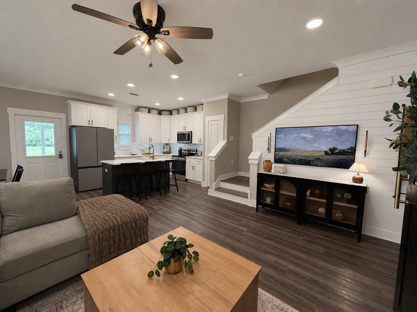 Welcome to 295 N Sand Palm Rd, a beautifully maintained 3-bedroom, 2.5-bath townhome located in the desirable Verandas at Freeport community. Built in 2021, this 1,471 sq ft home offers a bright, open-concept layout with modern finishes and comfortable living space throughout. The home features quartz countertops throughout, adding a clean, elevated finish to both the kitchen and bathrooms.

The main level features a welcoming living area, dining space, kitchen, and half bath, creating an easy flow for everyday living or entertaining. Just off the main living area, enjoy a screened-in porch, perfect for relaxing and enjoying the outdoors year-round. Upstairs, you'll find all three bedrooms, including a spacious primary suite with its own private bath.

The garage area has been converted to provide additional heated and cooled flex space, including two finished rooms and a utility room, offering extra functionality. This converted space is not included in the listed square footage and may be converted back to a garage if desired.

Verandas at Freeport offers community amenities including a pool, playground, pickleball, and basketball courts.