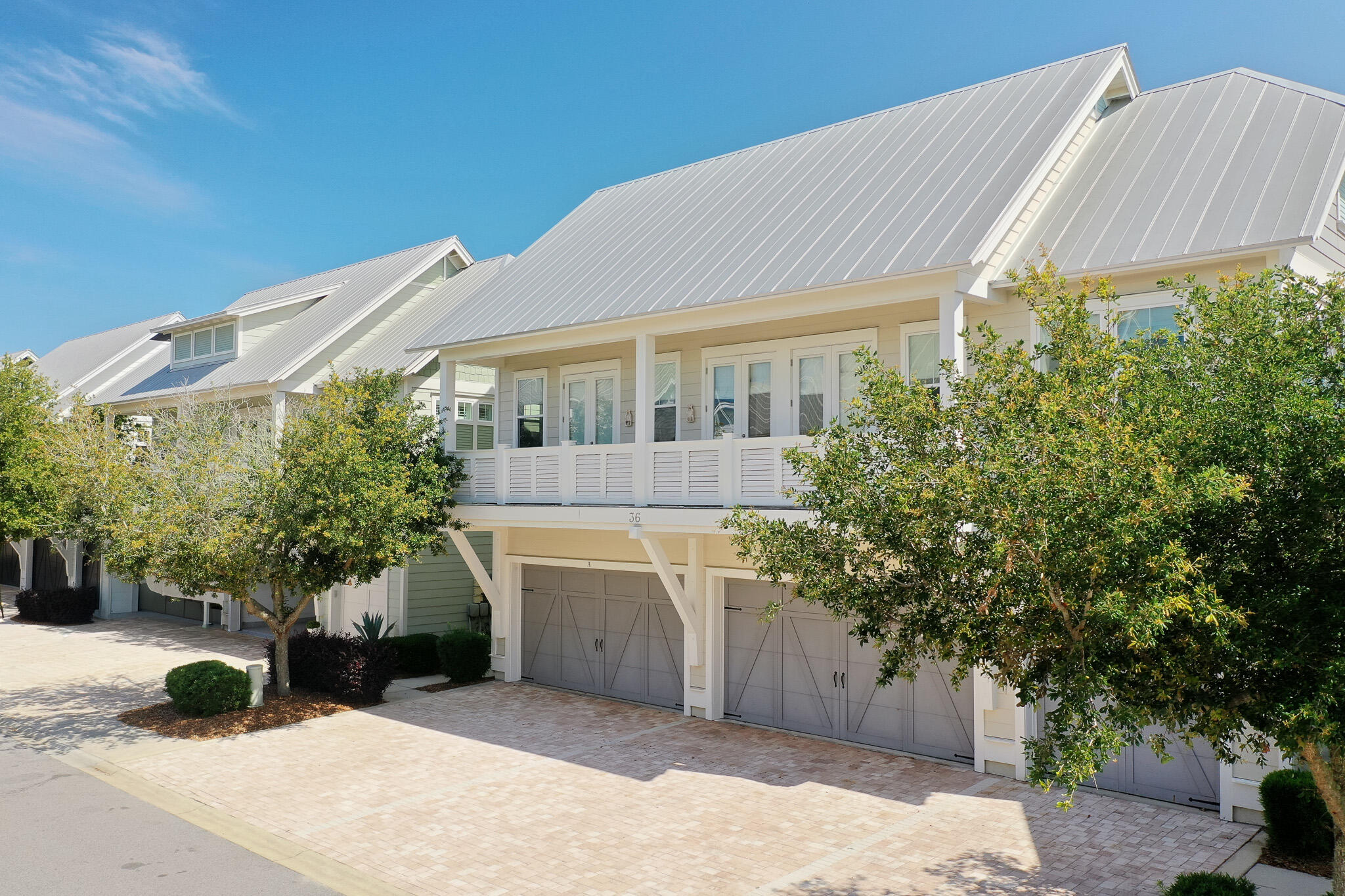 Experience the ultimate 30A lifestyle in this beautifully appointed, turn-key end-unit townhome located in the highly sought-after community of Prominence. Offering an expansive two-story layout this residence seamlessly combines sophisticated coastal style with maximum investment or multi-generational utility.Stepping inside the ground level, you are welcomed by an open-concept living, dining, and kitchen area defined by soaring ceilings and an abundance of natural light. The chef's kitchen is meticulously designed with a large center island, premium quartz countertops, upscale stainless steel appliances, making it an ideal hub for entertaining family and guests. The living space effortlessly flows out to a spacious, covered private porch, offering a quiet sanctuary .  Upstairs features the expansive primary suite, complete with an ensuite bathroom and ample closet space. Two additional generously sized bedrooms and well-appointed bathrooms offer comfort and privacy for everyone.   
Community & Lifestyle Amenities
Prominence is renowned for its resort-style amenity package with Big Chill right across the street for all food and entertainment for family and friends. This unit is meticulously  maintained and has never been rented. Hard to find among these units with lots of wear and tear. Rentals for these units range from 70,000-80,000 dollars Gross.