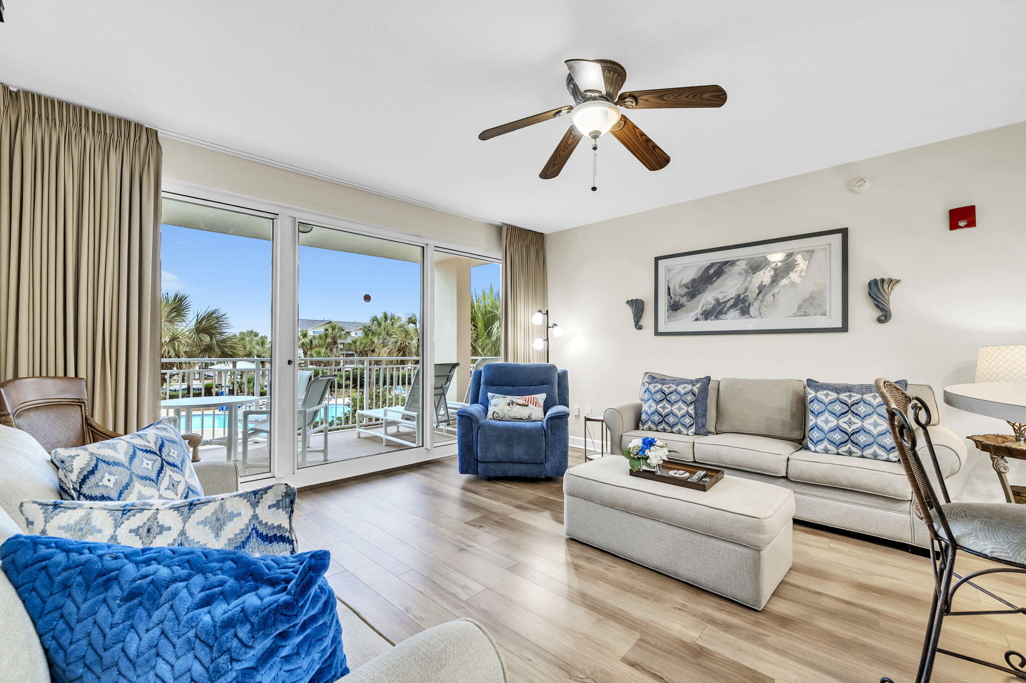 Sterling Shores- 1 bedroom second floor unit! A lovely condo with beachy decor! Perfect for a vacation get away! A fabulous resort with luxurious amenities! 400' of private deeded beach-heated beachside pool with a tiki bar & grill- views of an amazing huge lagoon style pool- first class fitness center- theater- and lush landscaping! Open floor plan which is very spacious, stainless steel appliances, unique oversized bar area  over looking the family room with lots of seating. Floor to ceiling sliding glass doors with balcony to enjoy the view of the lagoon pool. All new LVP flooring, washer/dryer, loveseat & couch both fold out to sleeper sofas, flatscreen tv, plus the bedroom has a new mattress & boxsprings! Just steps to the beach, restaurants, and close to shopping! Enjoy the Beach!  The unit sleeps 5 comfortably!