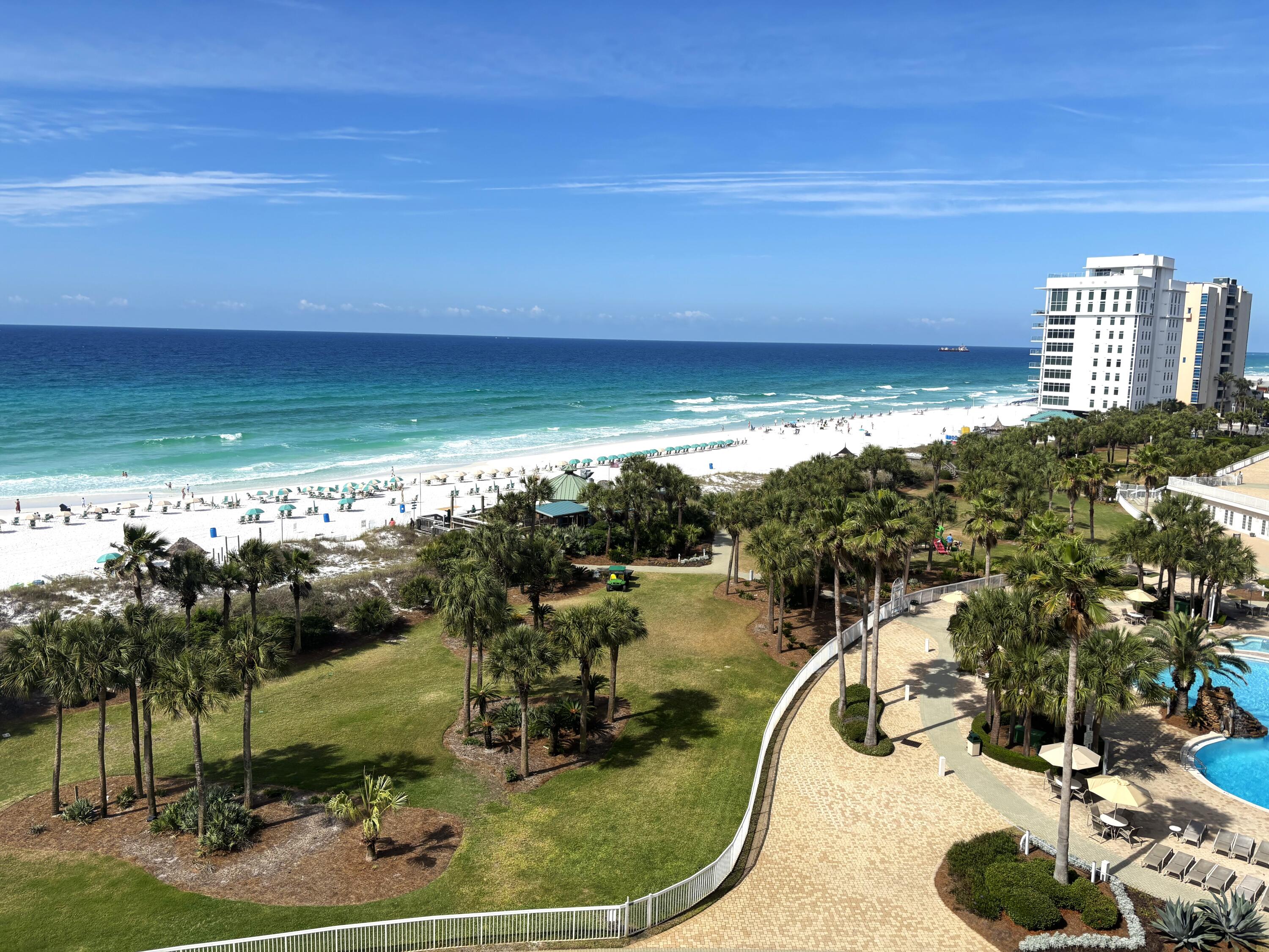 Amazing view of the coastline from the large balcony and from all the bedrooms. This floor plan has all Gulf front bedrooms. The balcony is positioned to minimize wind and to maximize the view, including outstanding sunsets. Elevator access right to your foyer.  Remodeled with an open kitchen, updated flooring, and top quality furnishings. Custom built in , walk in  closets.  Tile and glass showers, wet bar, and wine cooler. Full size washer and dryer in the laundry room. Moisture sensor automatically shuts off the water if there is a leak. Silver Shells has approximately 27 acres of  all the best amenities including beach access, pools, onsite restaurant, spa, fitness center, tennis, pickleball, and many fun attractions in the area.