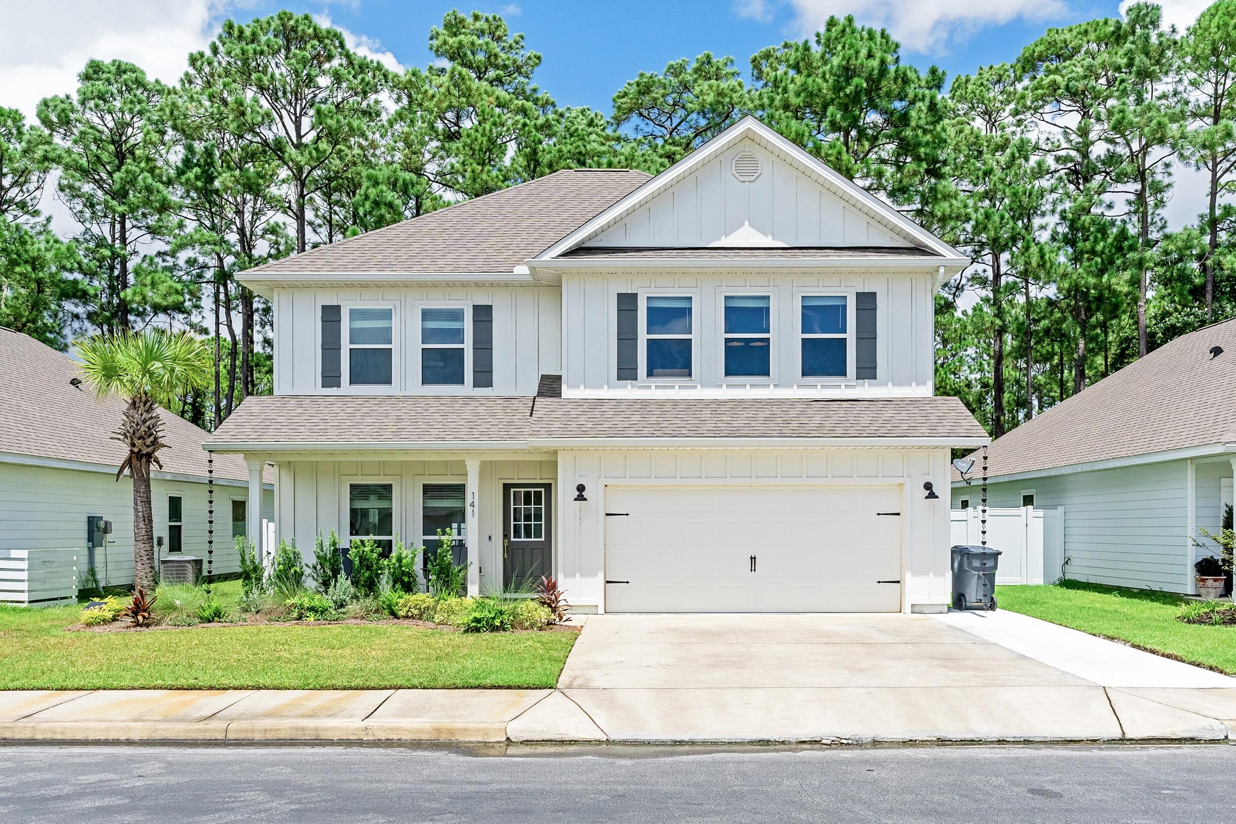 Tucked away in a quiet, private neighborhood yet just minutes to 30A, Gulf Place, and the emerald waters and sugar-white sand beaches of the Emerald Coast, 141 Southern Pines Rd. offers the perfect combination of peace, luxury, and convenience. This move-in ready home has been transformed with nearly $150,000 in high-end custom upgrades and is located in an area poised for significant value growth.

The first floor features a private primary suite with a spa-inspired bathroom boasting a custom-tiled shower with frameless glass, shiplap accents, and custom quartz countertops with upgraded sinks and fixtures. The suite also includes a custom-designed walk-in closet, barn doors, and automated blackout blinds for ultimate comfort and privacy. The open-concept kitchen, dining, and Tucked away in a quiet, private neighborhood yet just minutes to 30A, Gulf Place, and the emerald waters and sugar-white sand beaches of the Emerald Coast, 141 Southern Pines Rd. offers the perfect combination of peace, luxury, and convenience. This move-in ready home has been transformed with nearly $150,000 in high-end custom upgrades and is located in an area poised for significant value growth. The first floor features a private primary suite with a spa-inspired bathroom boasting a custom-tiled shower with frameless glass, shiplap accents, and custom quartz countertops with upgraded sinks and fixtures. The suite also includes a custom-designed walk-in closet, barn doors, and automated blackout blinds for ultimate comfort and privacy. The open-concept kitchen, dining, and

The open-concept kitchen, dining, and living room are ideal for both entertaining and everyday living, featuring custom quartz surfaces, brand-new GE appliances, a farmhouse sink, shiplap accents, and soft-close cabinetry. A designer half bath, screened-in porch, and attached 2-car garage complete the main level.

Upstairs offers three bedrooms, each with large closets, two full bathrooms with custom-tiled showers and frameless glass, a laundry room, and a spacious 530 sq. ft. bonus room perfect for a playroom, second living room, media room, home gym, or office. Throughout the home, every detail has been elevated upgraded door handles and cabinet hardware, dimmer rocker switches with decorator faceplates, and extensive LED lighting upgrades, including recessed can lights and modern fixtures in every room.

The backyard is a private retreat with lush landscaping featuring all-new coastal-style plants, two palm trees in the back and one in the front, fresh sod, a 3-zone irrigation system, and a custom-built retention wall with ample space to add a pool if desired. A vinyl privacy fence, extended driveway, professional exterior repaint, gutters with rain chains, and LED landscape lighting complete the home's standout curb appeal.

Steps from the neighborhood, Ellis Road is being extended directly to Highway 98 at a new signalized intersection, providing quick access to Publix and nearby shopping. Even more exciting, Walton County is developing a 10,000-seat amphitheater with recreation facilities, trails, and fishing ponds that will be about 2 miles from the home. The home is also just 1 mile from Choctawhatchee Bay, ideal for paddleboarding, kayaking, fishing, and boating. These enhancements will boost convenience, lifestyle, and property value, making this home a rare find in one of the area's most promising locations.

Furniture is also available to purchase with the home for an additional price, offering a true turn-key opportunity for the buyer.

Schedule your private showing today to experience the unmatched combination of luxury finishes, thoughtful upgrades, and an unbeatable coastal location.