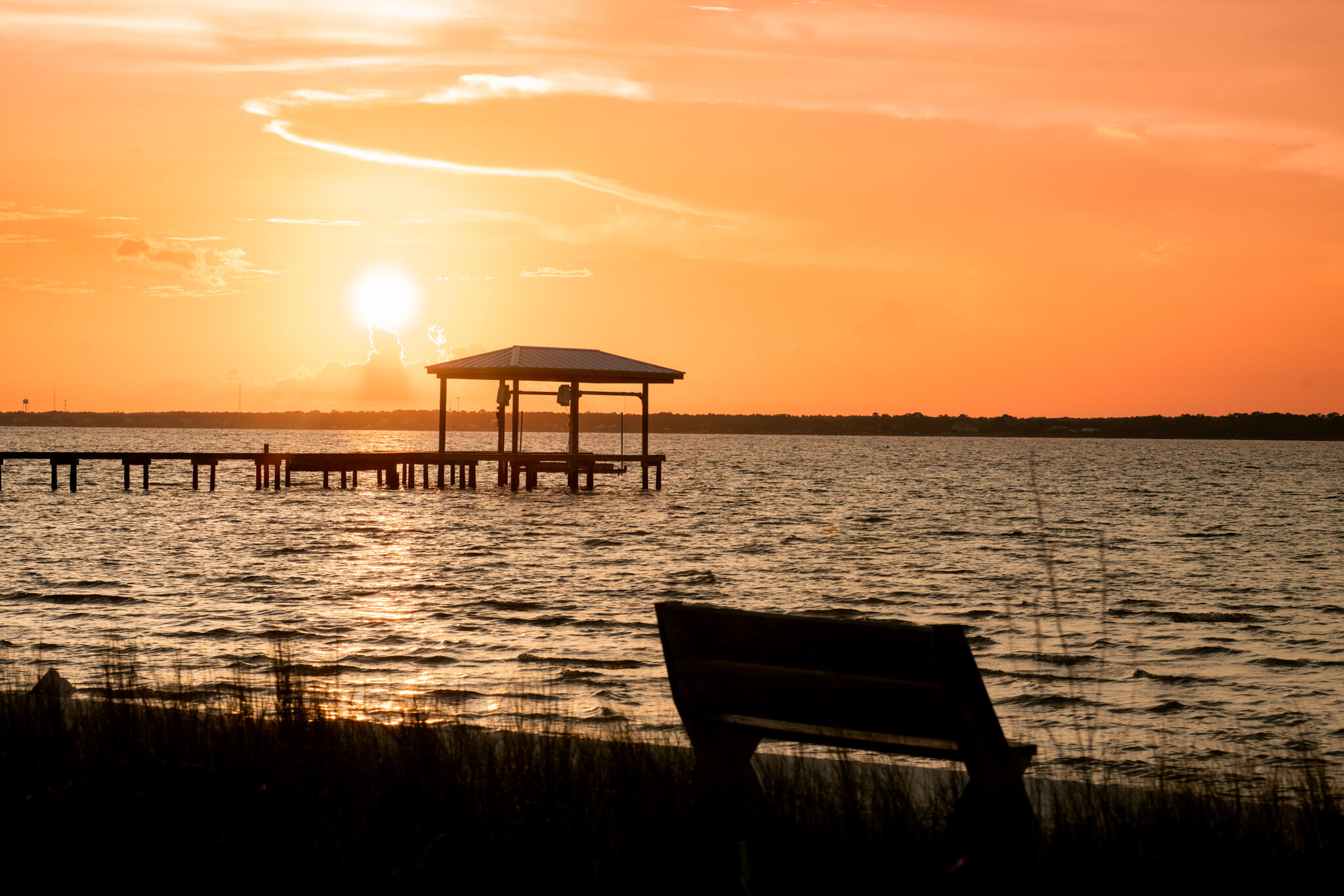 Build your dream waterfront home on the stunning Santa Rosa Sound in Navarre Beach. This exceptional waterfront homesite offers breathtaking views of the tranquil Sound and the opportunity to create a custom coastal retreat designed around the waterfront lifestyle.
Imagine enjoying spectacular sunsets from your backyard, launching a paddleboard or kayak from your private shoreline, fishing from your dock, or simply relaxing while taking in the beauty of the emerald waters. The Santa Rosa Sound is known for its calm waters, incredible wildlife, and easy access to the Gulf of Mexico, making it a paradise for boaters, anglers, and outdoor enthusiasts alike.
Conveniently located on Navarre Beach, you'll enjoy the perfect combination of waterfront serenity and proximity to sugar-white beaches, waterfront dining, shopping, and entertainment. Whether you're looking to build a primary residence, second home, or investment property, this rare waterfront opportunity offers the chance to create the coastal lifestyle you've always dreamed of.
Don't miss your opportunity to own a slice of paradise on the Santa Rosa Sound and experience the very best of life on the Emerald Coast.