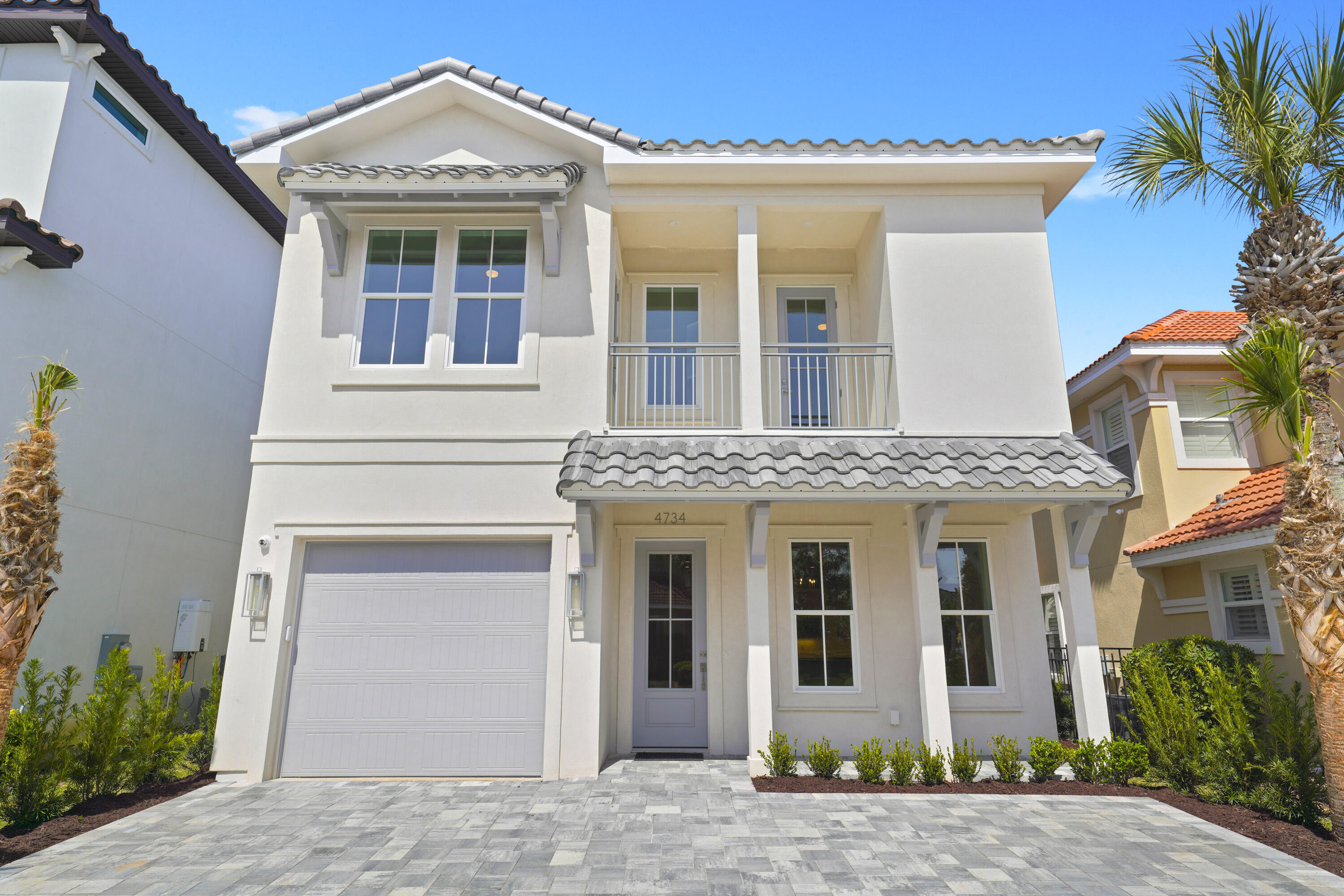 Located in the gated community of Calusa Bay, this newly constructed coastal home offers refined design and quality craftsmanship in the heart of Destin. Designed for comfort and privacy, the four-bedroom layout features private en-suite baths for each bedroom, 10-ft ceilings, 8-ft doors, engineered hardwood floors, custom wood cabinetry, quartz countertops, KitchenAid appliances, and designer lighting throughout. The luxurious primary suite includes a freestanding soaking tub, custom glass shower, double vanity, and vaulted ceilings.

Exterior features include a durable concrete stucco system, concrete barrel tile roof, impact Jeld-Wen windows and doors, slate paver driveway with three designated spaces plus garage parking, custom landscaping, vinyl fencing, and multiple outdoor living The primary suite is designed as a true retreat, highlighted by vaulted ceilings, a freestanding soaking tub, custom glass shower, and double vanity. The space feels intentionally quiet and spacious, balancing luxury with livability.

Outside, the home continues with durable and thoughtful construction, including a concrete stucco system, concrete barrel tile roof, and impact rated Jeld Wen windows and doors. A slate paver driveway provides three designated spaces in addition to garage parking, while custom landscaping and vinyl fencing create privacy. Multiple outdoor living areas extend the usable space, allowing the home to function comfortably for both everyday living and coastal entertaining.