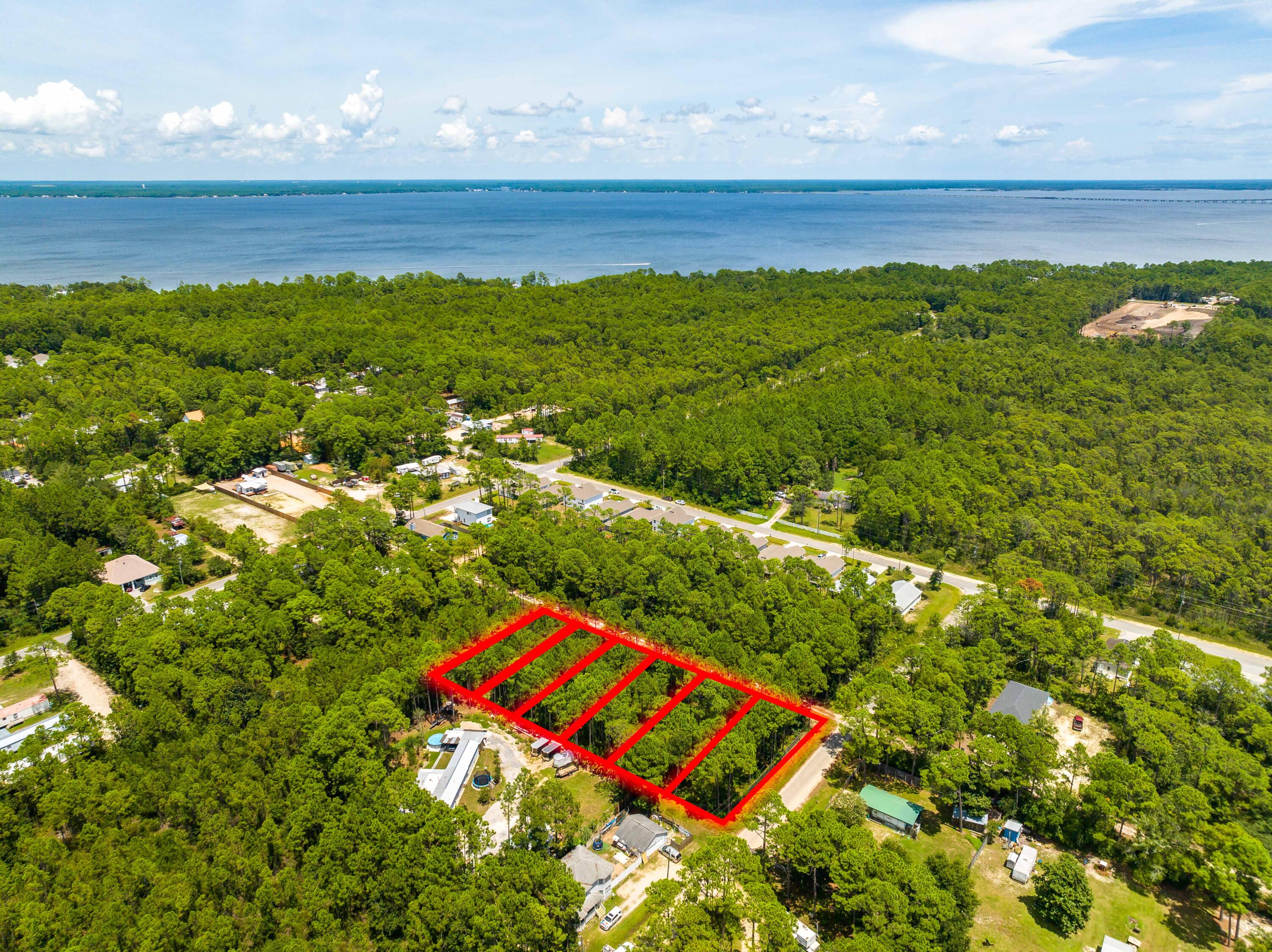 Attention Builders and Developers! An exceptional opportunity awaits you to bring your vision to life in the highly desirable North Santa Rosa Beach area. These six vacant lots (Lots 7, 8, 9, 10, 11, 12) are awaiting transformation, with Lots 11 and 12 already cleared and ready for your creative touch. All lots boast dimensions of 50x125, providing the perfect canvas for your next residential project.

With ample space to work with, the possibilities are boundless when it comes to designing and constructing your ideal homes. Nestled in a tranquil corner of Santa Rosa Beach, these lots offer a serene retreat while remaining just a short drive away from the vibrancy and amenities of the 30A area. From the breathtaking white sand beaches to the world-class golf courses and everything in Between your future homeowners will have access to the very best that Santa Rosa Beach has to offer. So why wait? Seize this rare opportunity to craft something truly extraordinary in one of the fastest-growing areas along the Gulf Coast. Reach out to us today to discover more about these prime development lots and embark on planning your next remarkable project!
