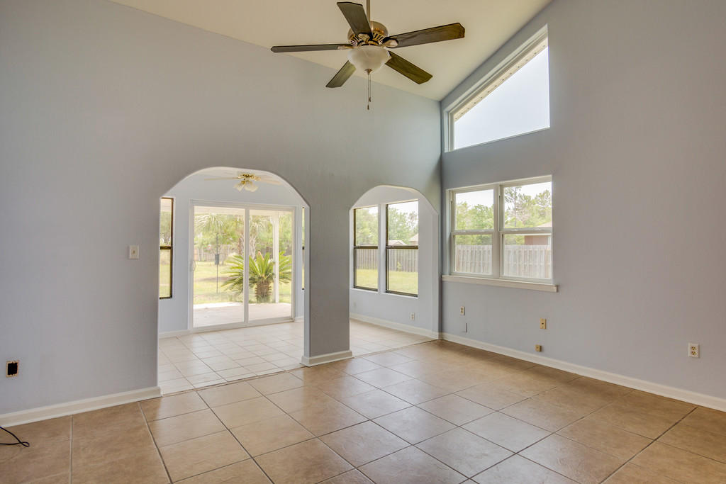 Better than New Home in Holley by the Sea for an amazing price! Granite counters in the open kitchen. New Siding, New windows (except in the sunroom), New Paint, New Carpet in the bedrooms, Tile flooring in living areas, New Master Bathroom, Newer AC and Roof. Over $40,000 in updates! All this and its on a half acre fenced lot. Don't wait! This house will only last minutes! Plus the Multi Million $$ Rec Center with 3 Pools, Sound access, East Bay boat ramp, Gym, Tennis Courts, Camping area, Playground, Fishing Pier.