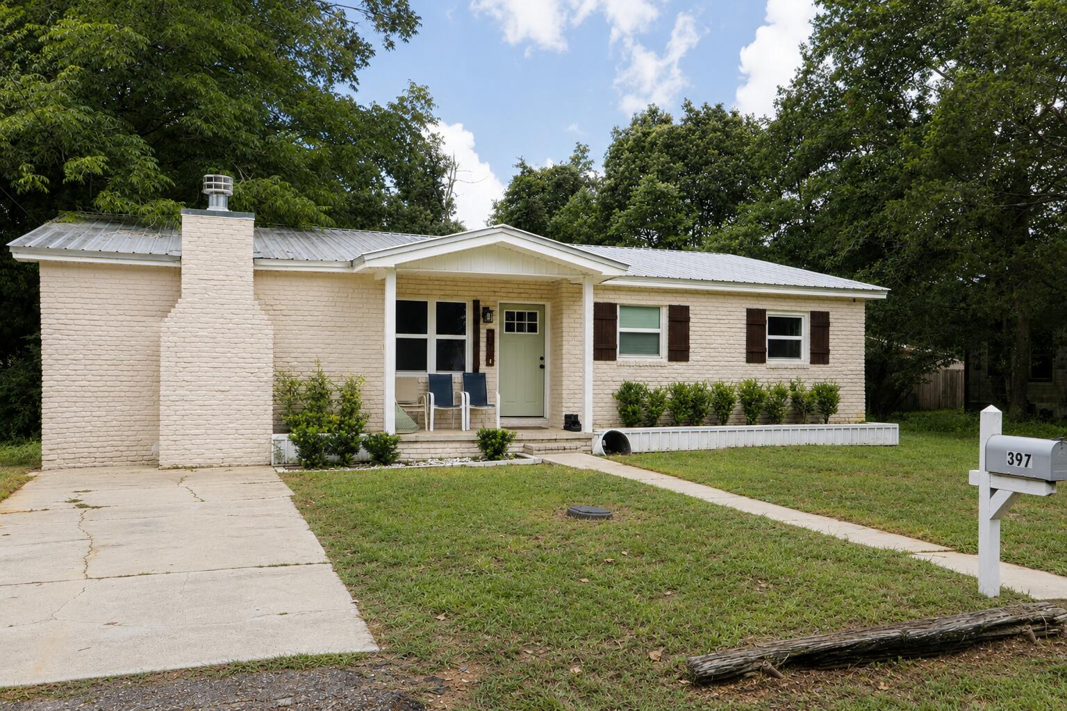 Welcome home! This 3-bedroom, 2.5-bath home offers plenty of space to spread out, both inside & out. Each bedroom features a large closet with built-in shelving & ceiling fans for added comfort.

The step-down living room is full of character with its cozy fireplace, while the spacious kitchen is designed with both style & function in mind. You'll find beautiful quartz countertops, abundant cabinet & drawer storage, soft-close drawers, three Lazy Susans, & a walk-in pantry that also houses the washer & dryer.

Step outside onto the large covered back deck, perfect for morning coffee, grilling, or relaxing in the evenings. The fully fenced backyard provides plenty of room for kids, pets, or entertaining family & friends.