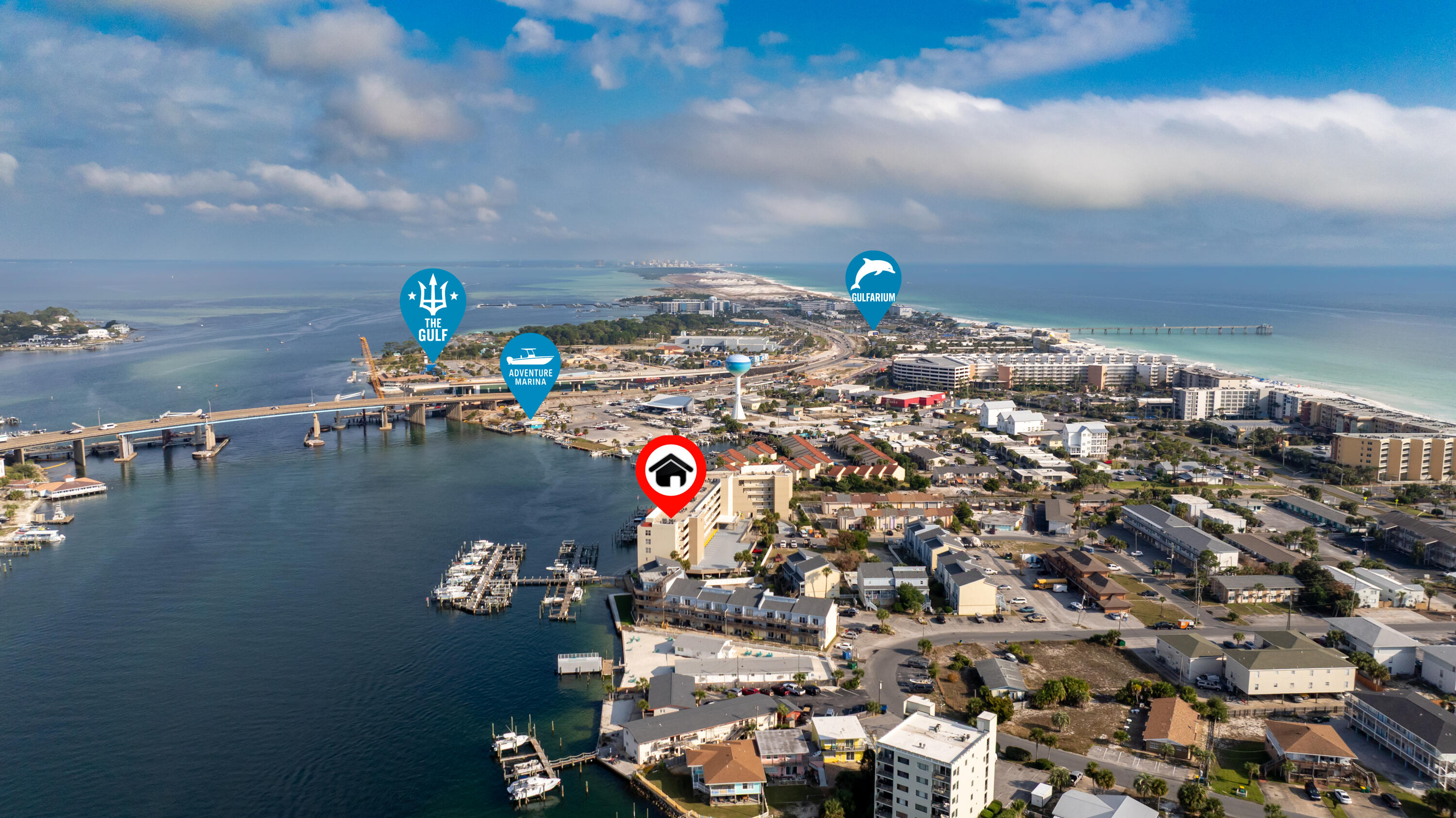 A 25' boat slip (#19) with a lift deeded. Prime short-term rental opportunity on Okaloosa Island! This penthouse, top-floor condo features 10 ft. ceilings and truly unbeatable proximity to the best of Northwest Florida just minutes to the white-sand beaches, waterfront dining, boutique shopping, and entertainment in both Downtown Fort Walton Beach and Destin. Whether for personal escape or as a high-performing STR, this location is hard to match. Located in a gated community, this property includes 2 covered assigned parking spots 39 & 40, owner storage lockers in the parking garage, and impressive amenities: a community pool & hot tub and a 25' boat slip (#19) with a lift. Enjoy panoramic views of the Intracoastal Waterway from the spacious balcony, accessible through a large glass sliding door that fills the living space with natural light. Inside, the unit offers tile flooring throughout, crown molding, and an open layout ideal for hosting guests. The kitchen features a convenient breakfast bar, a white enamel dual-basin sink, and plenty of cabinet and countertop space. The primary bedroom has a large picture window overlooking the water, a ceiling fan, and an ensuite bathroom complete with a glass-tiled walk-in shower with built-in seat. Additional conveniences include a full-size washer and dryer in the unit. Whether you're looking to capitalize on Okaloosa Island's thriving vacation-rental market or secure your own waterfront retreat, this penthouse unit checks all the boxes.
