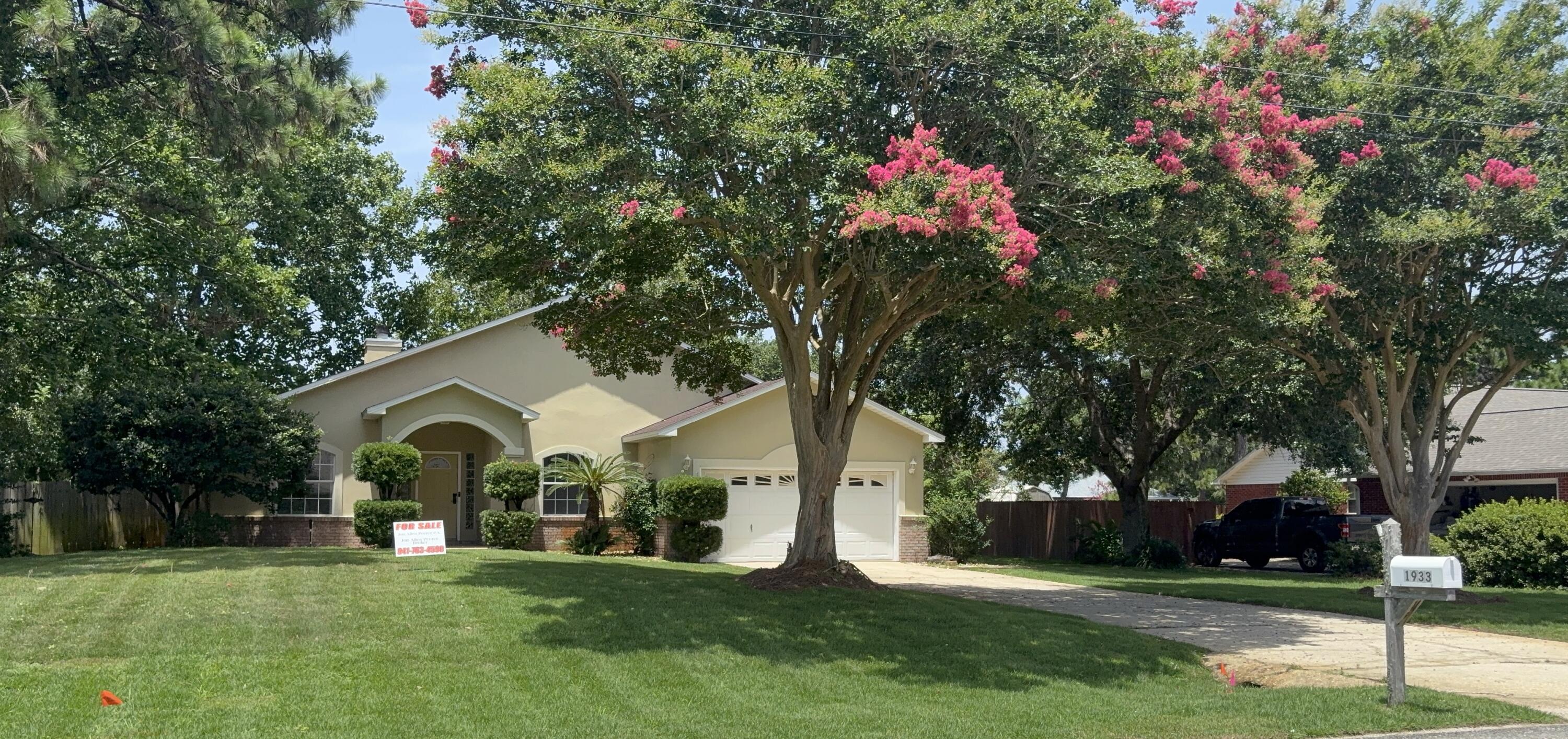 Well located at the front of the Holley By The Sea community.  This 4/2 has a new roof installed in 2025. Recently added also is a large (12' X 33') screened Florida room complete with ceiling fans with lights.  It is accessible both from the living room and the master bedroom. The kitchen has been upgraded. All counter tops are top quality granite, appliances steel. Exceptionally well done tile floors throughout. Master bath recently upgraded walk in  shower.  Handicap accessories have been added to both baths.