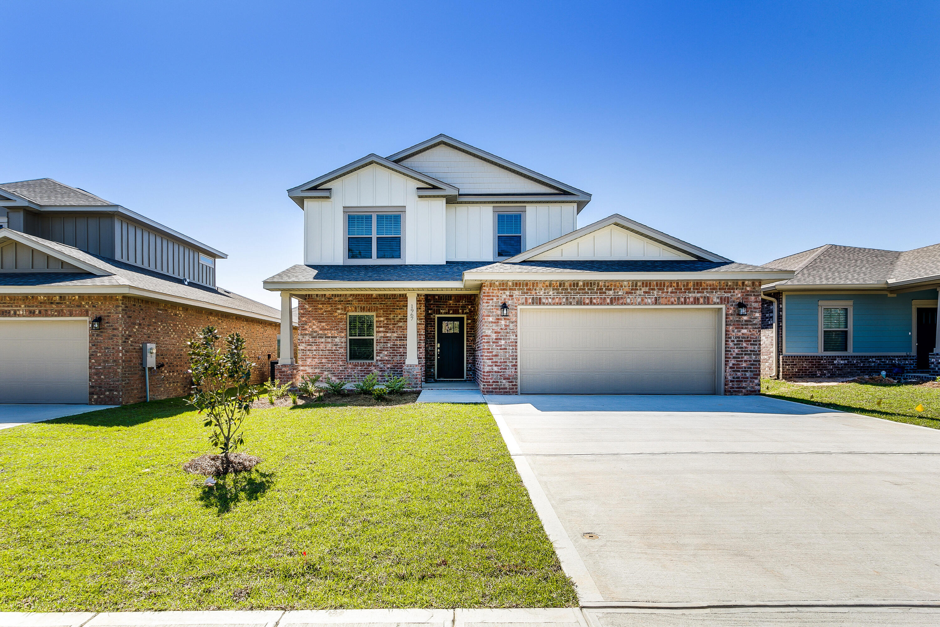No wetlands and located in an X-flood zone, this exceptional new home with many upgrades throughout. Clad with the timeless durability of brick, cement fiber board, and an architectural shingled roof. Sprinkler system and fenced backyard come standard! Interior offers luxury vinyl plank flooring in the first floor common areas, visually pleasing neutral tile in the baths and laundry room, and carpet in the bedrooms. Custom paint color is accented with a wide baseboard, beautiful crown molding, and spectacular tray ceiling accents in the first floor owner bedroom and dining room. Additional bedroom and full bath also located on first level. Stainless steel appliances including refrigerator, stunning shaker style cabinets, and granite throughout finish the home exquisitely.