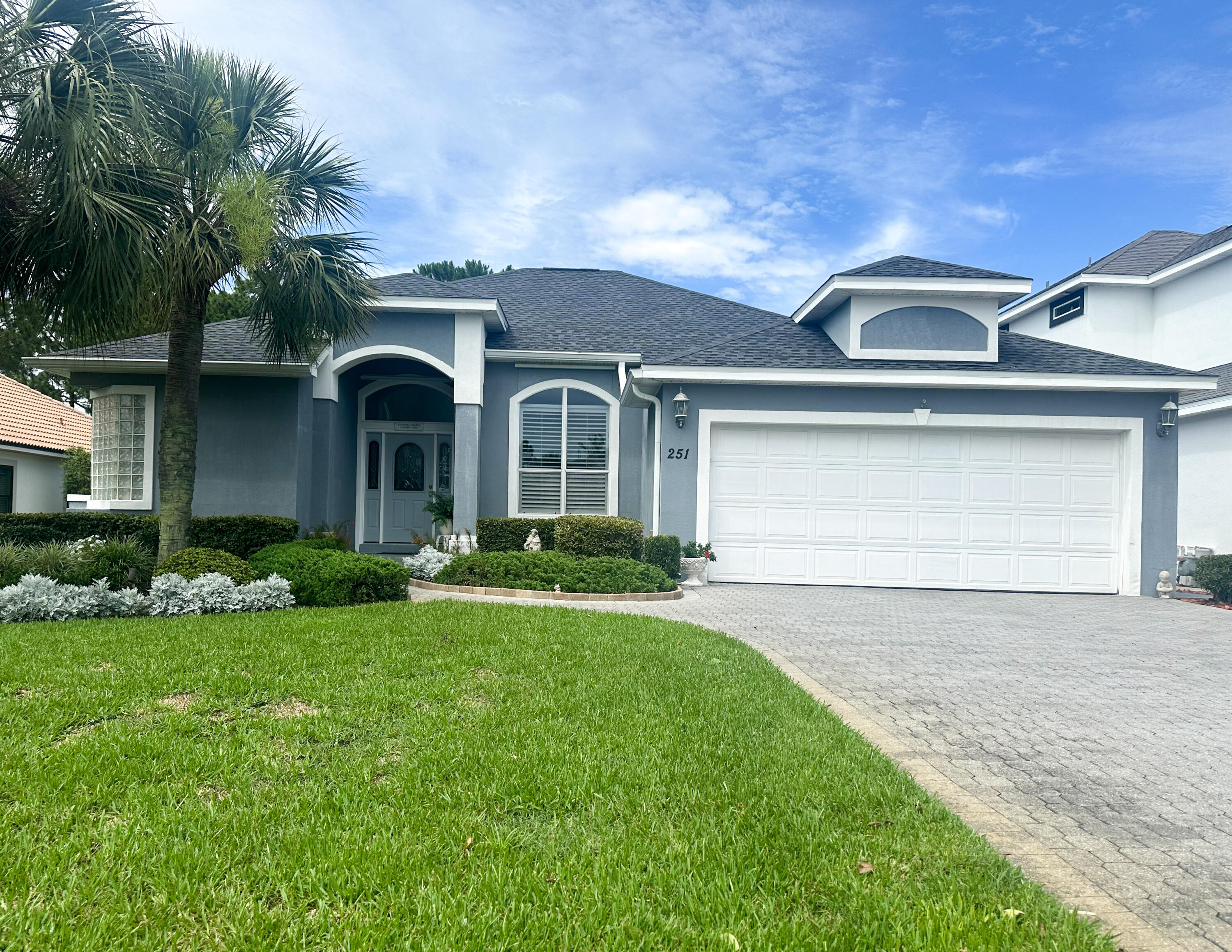 Absolutely stunning Bob Fisher built signature home. This home has been well maintained and is in fantastic condition. The roof was replaced in 2022. It has never had pets, nor has it been smoked in. The breakfast/coffee area view takes in a large screened in-ground pool and jacuzzi.  The family room has a cozy built-in entertainment wall. The kitchen is open to the family room and breakfast/coffee area and has stainless appliances and hard surface countertops. The home come with a full set of hurricane shutters for the entire house. Emerald Lakes is conveniently located to shopping, restaurants and the sugar white sand beaches. This gated neighborhood has a community pool, tennis court and pickleball courts, basketball court and a playground all of which is walking distance from this home.  Come take a look and let's work on making it your next home.