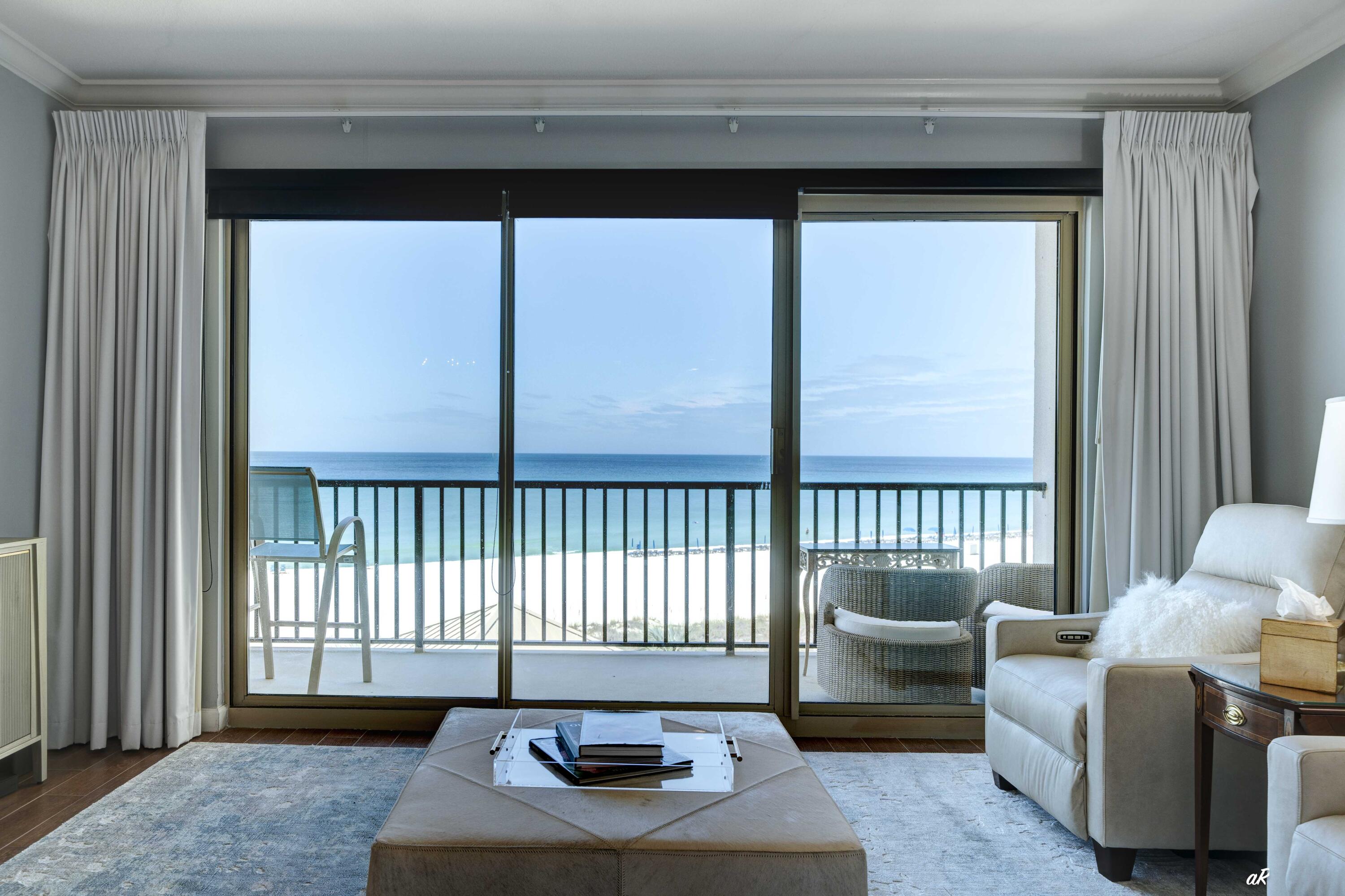 Experience the art of coastal living at its finest. Wake each morning to panoramic, unobstructed views of Panama City Beach's sugar-white sands and shimmering emerald waters from the privacy of your own balcony. This elegantly updated beachfront residence captures the sophistication of seaside living, blending timeless design with modern comfort. A sun-drenched open floor plan invites relaxation, featuring an expansive living area framed by floor-to-ceiling windows, a thoughtfully appointed kitchen with sleek appliances, and a dining space ideal for both intimate gatherings and entertaining guests.

The primary suite offers a serene retreat with generous closet space and a private en-suite bath, while the spacious guest bedroom includes its own full bath for ultimate comfort and privacy. Furnishings are negotiable, and the unit is being offered fully equipped with all appliances and three televisions for a seamless move-in experience. Thoughtful upgrades include blackout curtains, pull-down mesh shades, and a full laundry room designed for everyday convenience.

Located within Summerwinds, one of the area's most desirable non-rental communities, residents enjoy a quiet, private setting rarely found along the Gulf. The residence conveys with a deeded garage parking space with electricity--ideal for additional storage or EV charging--as well as hurricane shutters for added protection and peace of mind.

Resort-style amenities elevate coastal living, including two beachfront swimming pools (one heated), direct access to the sugar-white sands and emerald waters, and a gazebo overlooking the stunning Gulf of Mexico--an inviting gathering place where owners come together to enjoy unforgettable sunsets.

Whether envisioned as a luxurious vacation retreat, refined investment opportunity, or full-time Gulf-front residence, this condominium captures the essence of effortless elegance and the unmatched beauty of life by the sea.

All information is believed to be accurate; buyers are encouraged to verify any details deemed important.