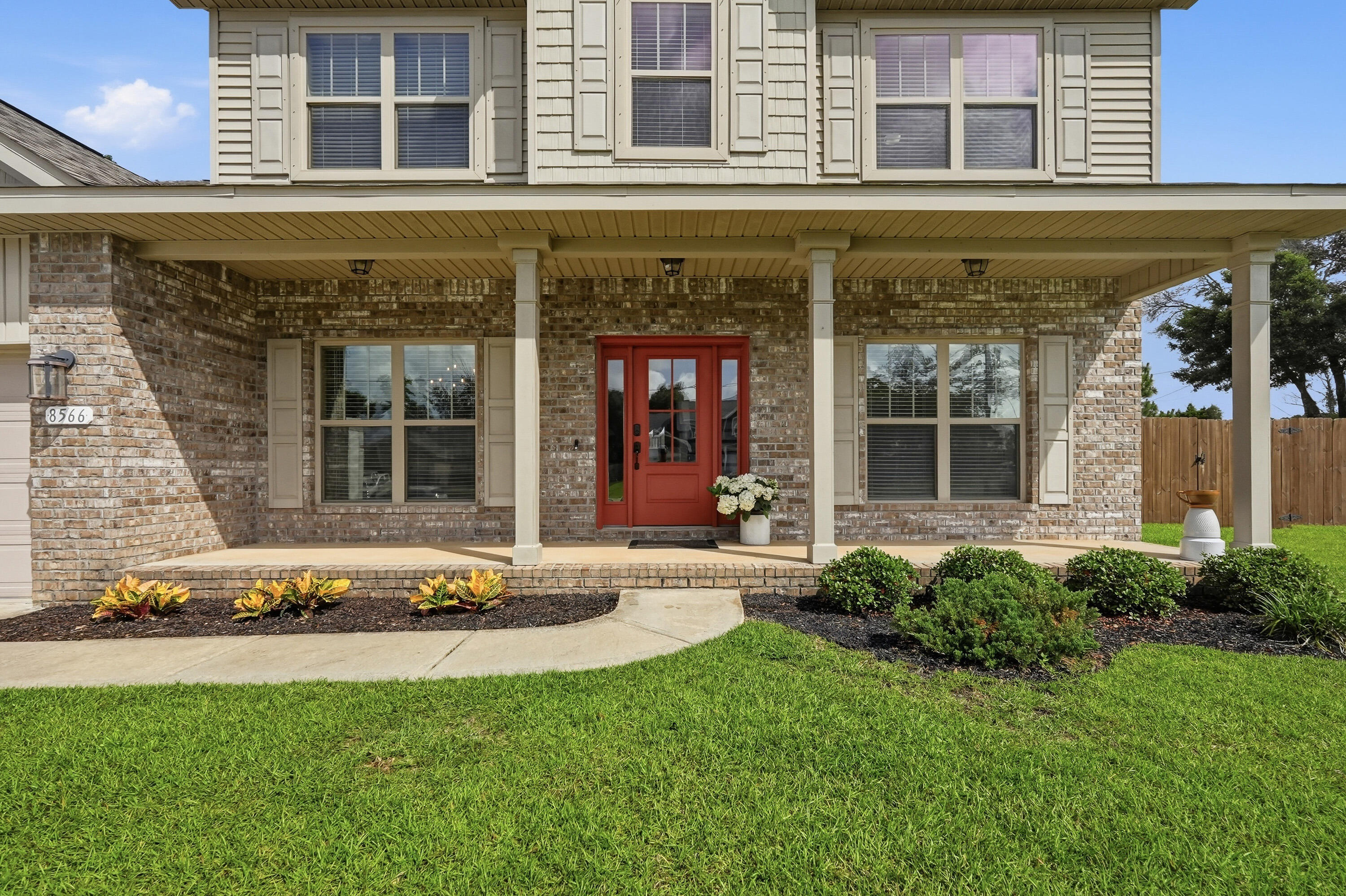 Tucked away on a quiet cul-de-sac in Navarre, Florida, this stunning 2018 Whitworth built home with bullnose corners is ready for new ownership.  This beautifully maintained 5 bedroom, 3 full bathroom home offers the space, comfort, and versatility that you are looking for. 

Exceptional curb appeal welcomes you home with a lush lawn, fresh mulch, and attractive landscaping. Step inside to discover 9 foot ceilings, abundant natural light, and a thoughtfully designed floor plan. Just off the entryway, a flex room which provides endless possibilities such as a home office, playroom, or sitting area. Enjoy meals with family and friends in your formal dining room which overlooks your beautifully maintained front yard.

Designed both for everyday living and entertainment, the open concept kitchen serves as the centerpiece of the home. It features a breakfast area, a huge island with decorative stone accent, stainless steel appliances, recess lighting, granite countertops, attractive backsplash, oversized walk-in pantry, access to additional under stairs storage, tons of cabinets space, and ample workspace. This amazing kitchen overlooks the expansive living room, complete with large windows to allow for exceptional natural lighting and creates a seamless gathering space for family and friends. 

From there, step outside to the large covered back patio, perfect for relaxing evenings, weekend cookouts and gatherings. A first-floor bedroom and full bathroom offer ideal accommodation for guests, extended family, or a private home office setup.  On the second level of the home, you will find four additional bedrooms including a spacious owner's retreat, and a conveniently located laundry room.  The owner's suite features an elegant tray ceiling, large tile bathroom floors, dual vanities, a garden tub, separate shower, and TWO walk-in closets, one of which is a custom designed closet that provides exceptional storage opportunities, presentation, and organization.

Other features of this home include, but are not limited to, a covered front porch perfect for evening relaxation, an extended driveway, an additional road behind the home which allows for access to the backyard, a beautiful wooden staircase leading to the second level of the home, and large baseboards.

Located just minutes from the Emerald Coast's sugar white beaches, community boat launches, local favorite restaurants, and popular shopping destinations, this home perfectly combines coastal convenience with everyday comfort. Situated on a generously sized lot, it offers the style, functionality, and space to make it your own.  This home could be your dream come true!

Let's not forget that location matters, as this home offers easy access to the interstate and major local highways.  You'll enjoy both a peaceful neighborhood setting and quick access to surrounding areas.

Don't miss your opportunity to call this exceptional property yours.  Welcome Home!
 
Buyer(s) is responsible for verifying ALL data and information, including lot size and room measurements, as it is deemed to be reliable but not guaranteed.