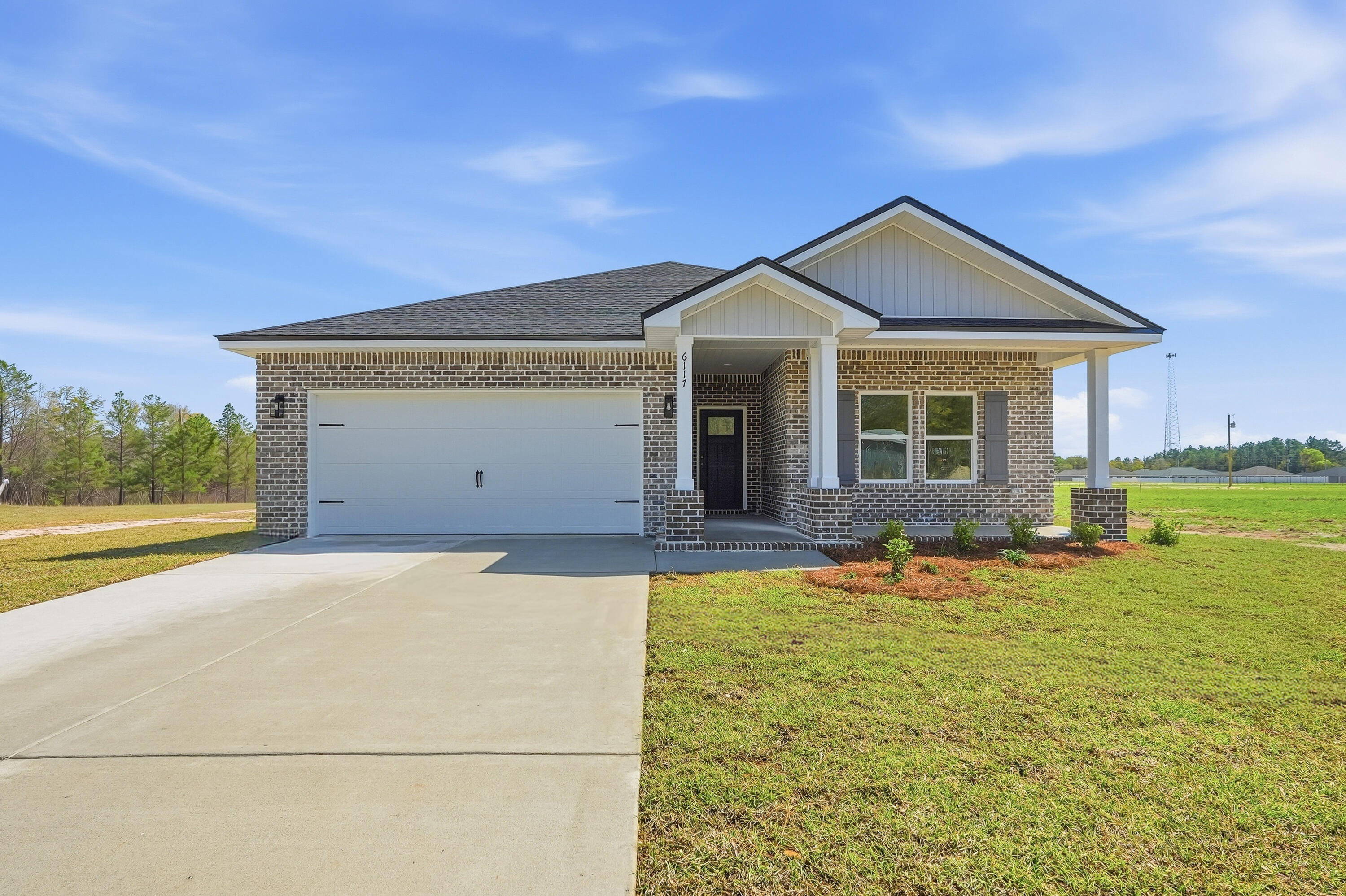 READY NOW!!! THE 'MAYBELL' STRETCHED OUT TO 1600 SF - SPRING TIME SPECIAL - $20,000 towards closing costs/prepaids/rate buydown, + BLINDS & REFRIGERATOR, MUST CLOSE BY MAY 15, 2026 - 'Southern Charm S/D' has low county taxes, no HOA.  Seamless flow from the foyer to open family gathering space overlooking kitchen/dining nook.  Raised ceilings, recessed lighting with luxury vinyl plank flooring in main areas.  Quartz kitchen work island has bar seating, white shaker style cabinets + corner pantry.  Split BR plan with owner's bath featuring double vanities, walk-in closet, shower only & linen storage.  Cozy front and rear porches, landscaped 1/4-acre lot, and finished garage.