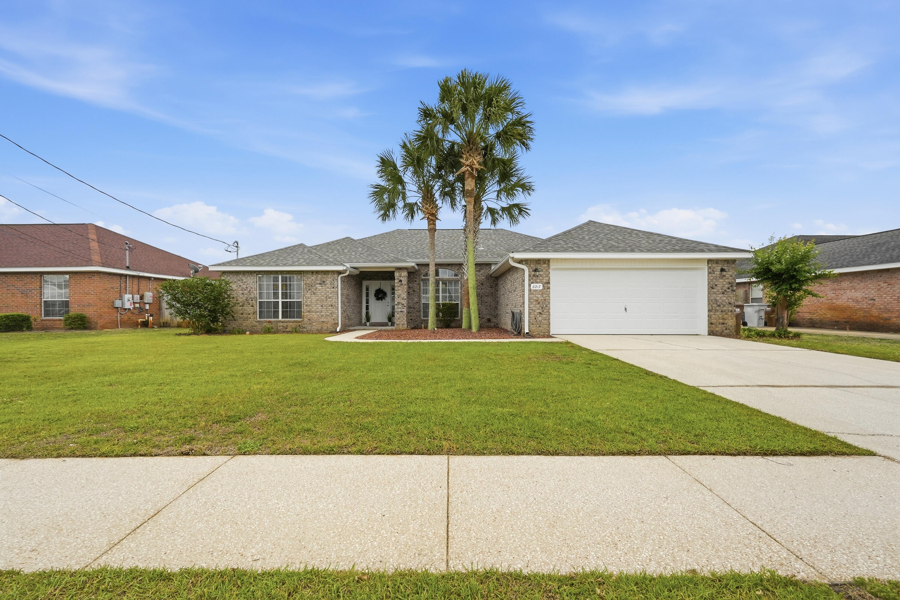 Your search stops here at this beautifully
maintained, 4-bedroom, 2-bath home in the desirable Sky Ridge Estates
community.

This home is conveniently located within
minutes of all things Navarre. This
includes the beautiful beaches that this area is so well known for, restaurants, shopping, sporting facilities, schools, and so much more.

Enjoy an amazing bright and open floor plan with a formal dining area, a spacious kitchen featuring granite countertops, an island with a large built in sink, breakfast area, lots of cabinets, and a pantry. This home is perfect for gatherings and features a privacy fenced backyard with an open patio, a pergola, and the ultimate space for you to create your dream outdoor sanctuary.   The split layout of this house offers a private owner's retreat with windows that offer lots of natural lighting, two walk-in closets and a stylishly updated bathroom that features a double vanity with upgraded sinks, a garden tub for relaxing after a long day, and a separate shower with a glass door.  Three additional bedrooms are thoughtfully situated on the other side of the home in addition to another full bathroom.

You'll love the added touches this home has to offer, including a large sliding glass door that allows for lots of natural lighting and easy access to the backyard, beautiful light fixtures, a decorative living room fan, and gutters, just to name a few.  

Don't wait.  This is HOME!

Buyer(s) are responsible for verifying ALL data and information, including lot size and room measurements, as it is deemed to be reliable but not guaranteed.