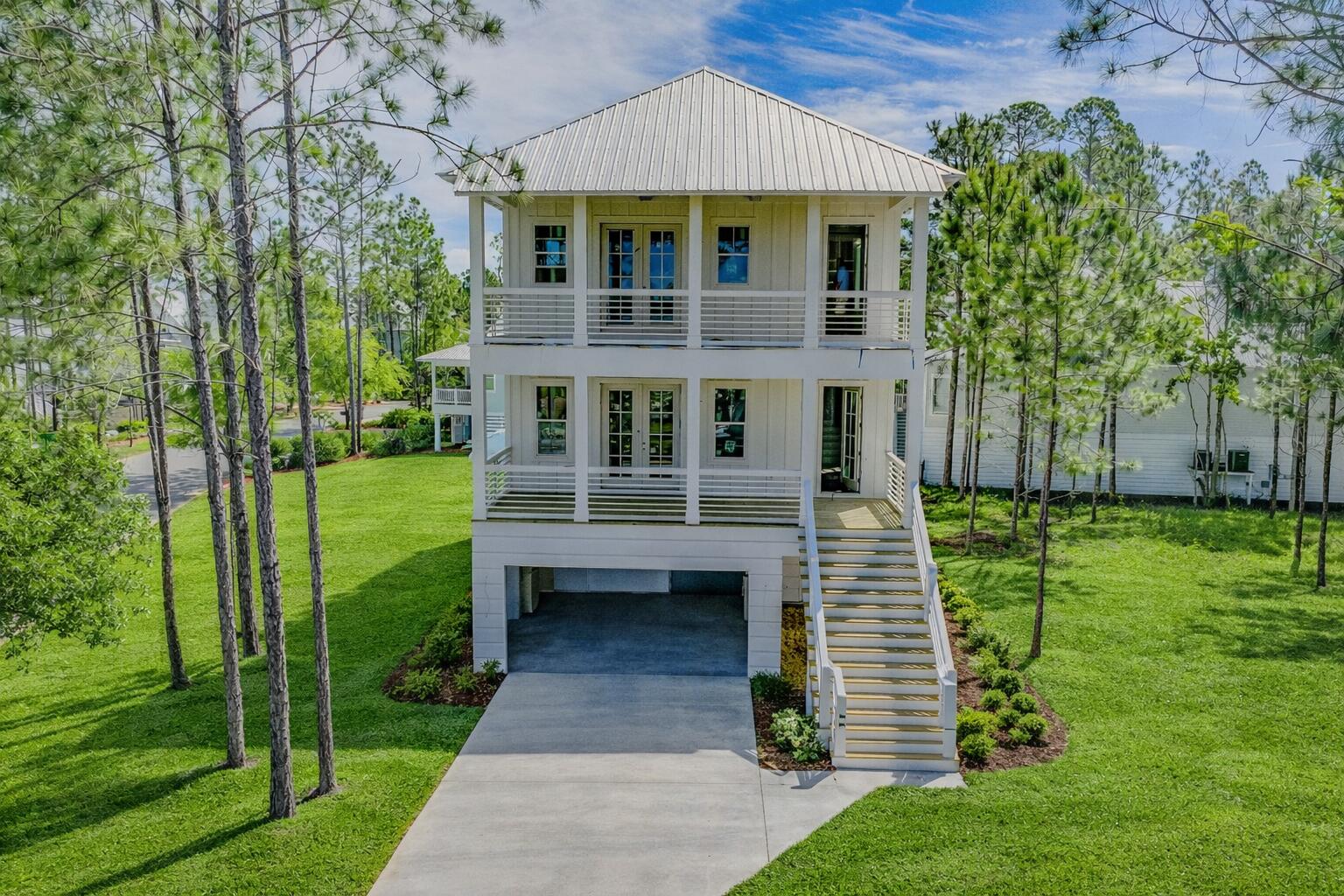New construction in the gated bayfront community of Cessna Landing in Santa Rosa Beach. This thoughtfully designed coastal home features a spacious floor plan with a large driveway and garage area below.
The home offers a bright, open layout with abundant natural light and quality finishes throughout. Multiple covered porches on both levels provide ideal outdoor living space, perfect for enjoying the peaceful surroundings.
Cessna Landing is a private, gated community offering close proximity to the bay, with a nearby public boat ramp providing easy access to the water for boating and fishing. Conveniently located just a short drive to the beautiful beaches of the Emerald Coast.
A great opportunity for a primary residence, second home, or investment property in a desirable Santa Rosa Beach