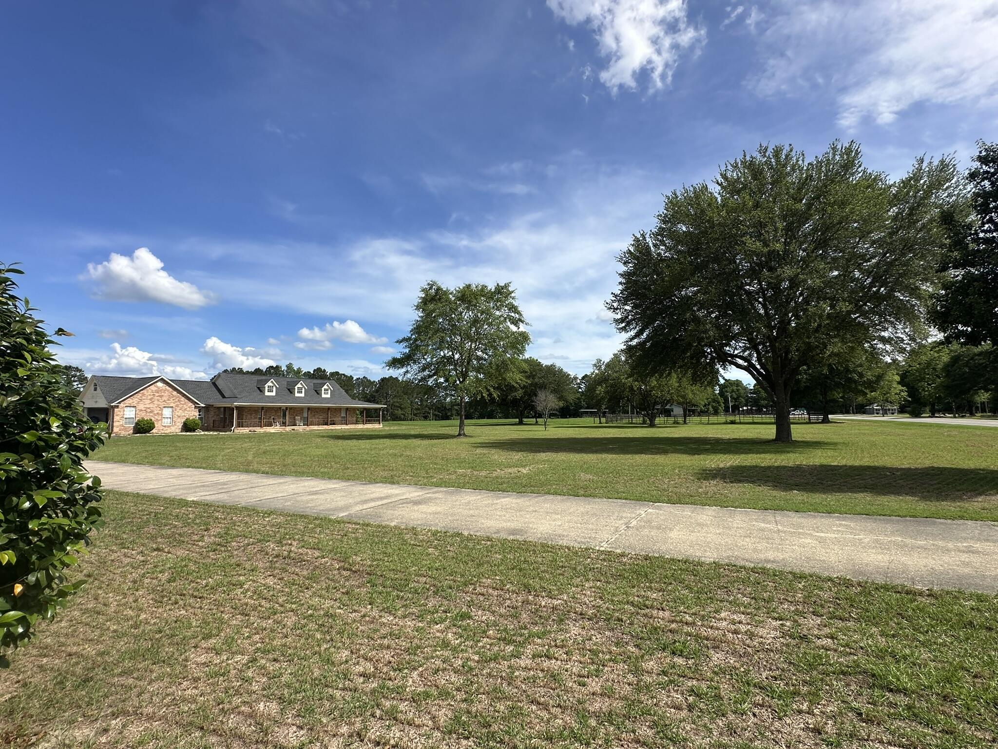 Shown by appointment only. Located in the Florala, Alabama area, this 7.46+/- acre property features a single-family home set on a usable tract of land offering space, privacy, and flexibility in a rural setting.

Florala is a small southern Alabama town known for its laid-back pace and access to outdoor recreation, including nearby Lake Jackson and surrounding natural areas. The property provides a quiet setting while still maintaining access to local conveniences, with Crestview, Florida, I-10, and regional destinations within a reasonable drive.