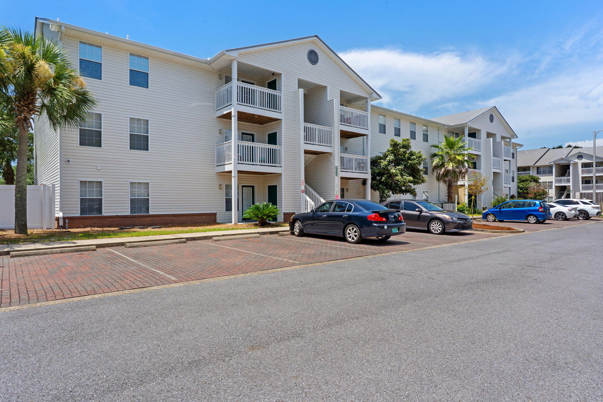 This ground-floor condominium offers a spacious and functional one-bedroom, one-bath layout with approximately 920 square feet of living space. The well-designed floor plan provides comfortable flow between the living, dining, and kitchen areas, creating an open yet defined arrangement suitable for a variety of living needs. The ground-level location allows for convenient access without the use of stairs, adding ease for daily entry and exit.

Upon entering the unit, you are welcomed into a generously sized living area with ample wall space for furniture placement and entertainment setup. The open configuration allows flexibility in arranging seating and décor to suit personal preferences. Natural light enhances the interior atmosphere, contributing to a bright and inviting setting. The adjoining dining area offers practical space for everyday meals or casual gatherings. Positioned near the kitchen, it allows for efficient meal preparation and serving. The kitchen features sufficient cabinet storage and counter space to support daily cooking needs. Its layout maximizes usability while maintaining connection to the main living areas.

The bedroom is comfortably sized and designed to accommodate standard furnishings with room to spare. Closet space provides practical storage, helping maintain organization. The bathroom is conveniently located and features a functional layout that supports daily routines.

Situated within Indian Lake, the community provides a range of amenities designed to enhance everyday living. Residents have access to a swimming pool, offering a space to relax and enjoy outdoor leisure. A fitness center is available for those who wish to maintain an active routine without leaving the community grounds. The clubhouse or community center provides additional shared space that may be used for gatherings or association-related activities, as permitted by community guidelines.

The landscaped grounds contribute to the overall setting, with maintained common areas that reflect ongoing community care. Parking is available within the development, and association management oversees maintenance of shared spaces, subject to HOA guidelines and fees. Prospective buyers are encouraged to review association documents, rules, and financial information as part of their due diligence process.

Located in Destin, this condominium benefits from proximity to a variety of shopping, dining, and service establishments. The surrounding area offers convenient access to retail centers, grocery stores, professional services, and recreational opportunities. Destin is widely recognized for its coastal setting and access to beaches, waterways, and outdoor activities, all contributing to the overall appeal of property ownership in the area.

The central location allows for straightforward commuting within the city and to nearby communities along the Emerald Coast. Buyers seeking a property with access to local conveniences while maintaining a residential setting may find this location appealing.

This condominium presents a practical option for those exploring real estate opportunities in the Destin market. The larger one-bedroom floor plan provides added interior space compared to many similar configurations, allowing greater flexibility in layout and use. The ground-floor placement adds accessibility and convenience, while the established community setting offers amenities that support a well-rounded living experience.