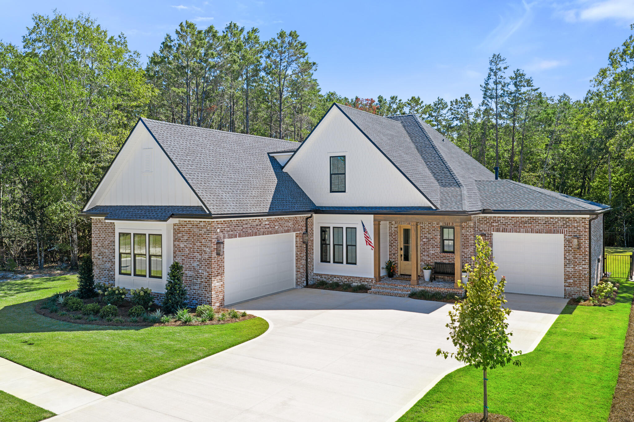 Gorgeous home on oversized lot within prestigious community of Vineyards at Hammock Bay.  Built by award winning local builder this two story luxury home features a bonus room, an oversized 3 car garage, a living room fireplace with built-in cabinets and floating shelves, a study with French doors and custom built-ins, and full summer kitchen.  The chef's kitchen offers Cambria countertops, Woodharbor cabinets to the ceiling, and luxury appliances.  Hardwood floors anchor the main living spaces and bedrooms.  Primary suite bath provides a spa-inspired retreat with oversized free standing soaking tub and custom tile work.  Outdoor living is elevated with an oversized homesite, full built in summer kitchen, and covered porches for entertaining.  Residents enjoy gated privacy with access to resort-style amenities including pools, trails, courts, and social gathering spaces.