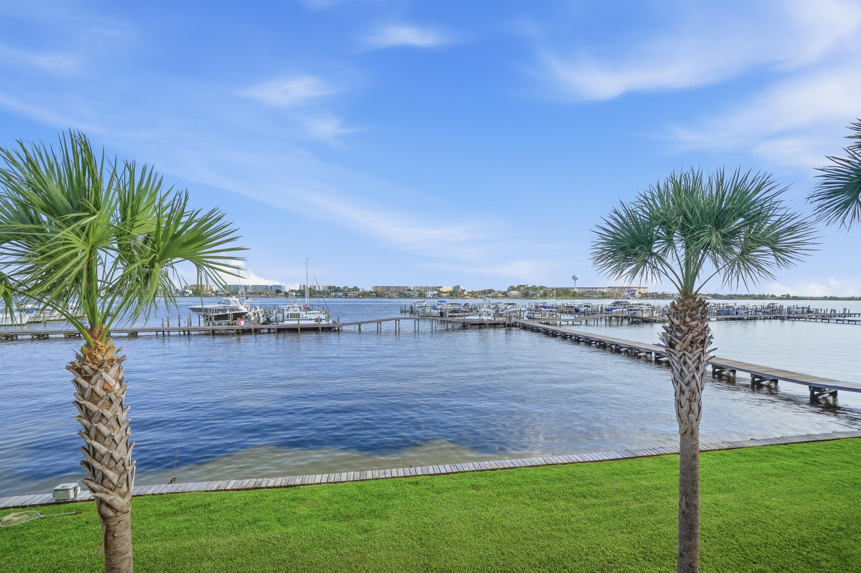 Tucked away in the gated waterfront community of Brooks Landing, this fully remodeled, move-in-ready townhouse offers expansive water views and extensive updates throughout. Residents enjoy access to two community pools, a marina perfect for fishing, kayaking, and paddle-boarding, and a quiet, serene waterfront setting. This home has been extensively upgraded with every major feature already completed. Recent 2025 improvements include a fully remodeled primary bathroom, new kitchen appliances, a new water heater, granite countertops, a new balcony with Trex decking, new patio ceiling fan, and all new baseboards downstairs. In 2026, the downstairs bathroom was completely remodeled. Additional updates include a new roof (2022), new gutters (2022), impact-rated sliding doors and windows (2023), guest bathroom remodel (2022), new upstairs tile flooring throughout (2022), fresh paint upstairs (2022), new upstairs baseboards (2022), French doors leading to the balcony off the master bedroom (2022), new ceiling fans throughout including kitchen, master, guest, and living room (2022), a custom primary closet system (2024), and a new retractable awning extending 10' for added shade (2022). VA Assumable rate only 2.375%. This is a rare opportunity to own an updated waterfront townhouse in Brooks Landing. With nothing left to do but move in, Seller also including for buyer's convenience washer, dryer, Ring doorbell, 75in Living room TV and garage fridge! Must see this HGTV show stopper! Assumable flood policy $3966/year.  No boat slip included. Slips can be purchased separately when available at Brooks Landing and sister property Pirates Bay. Termite bond with Terminex. Roof 2022
AC 2016 & Water Heater 2025.